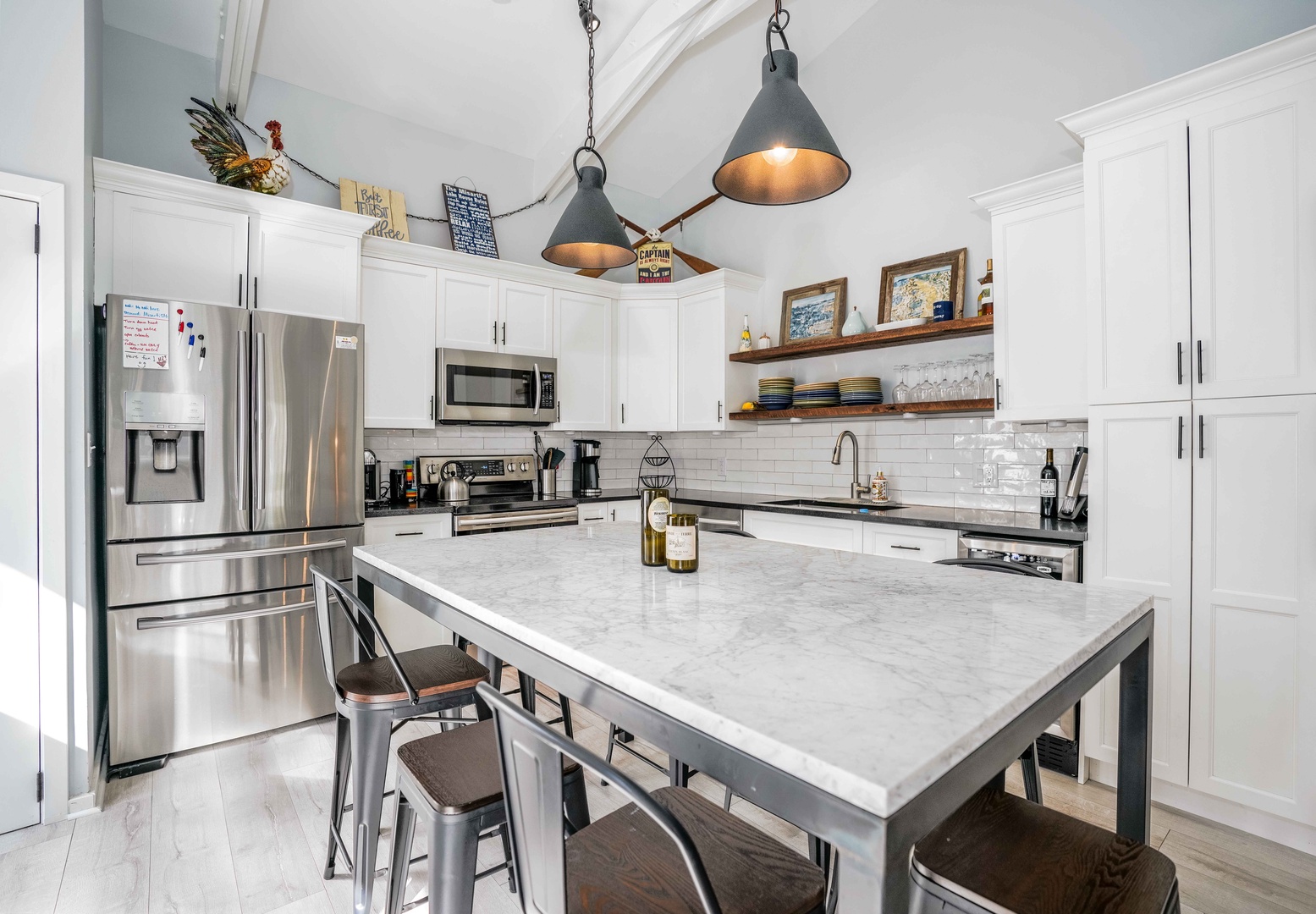 The open, airy kitchen offers ample space & all the comforts of home