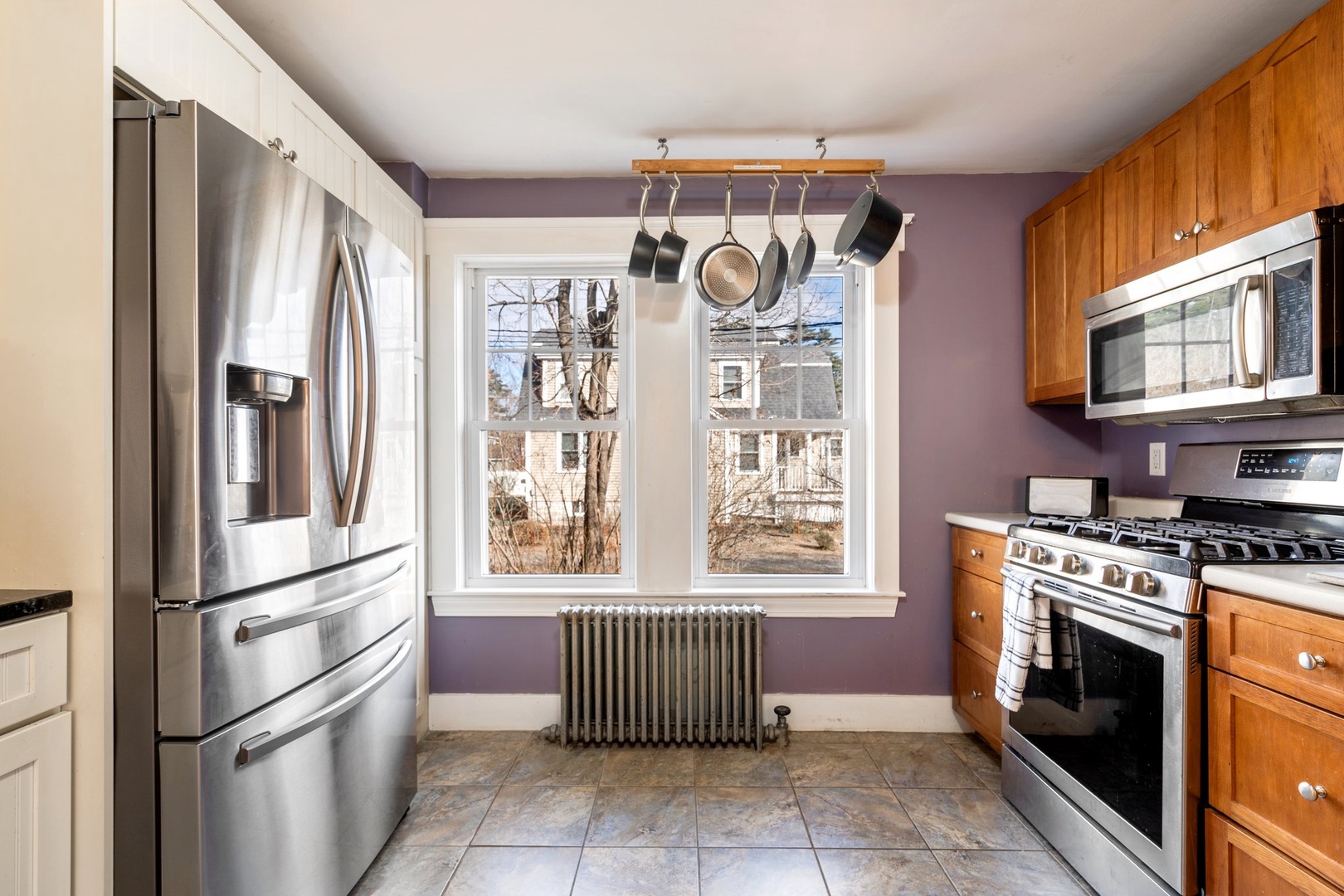 The open, airy kitchen offers ample space & all the comforts of home