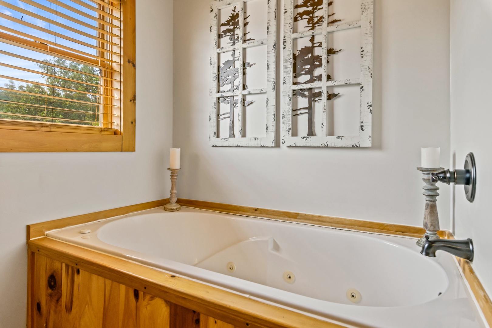 A double vanity, shower, & Jacuzzi tub await in the 2nd-floor full bath