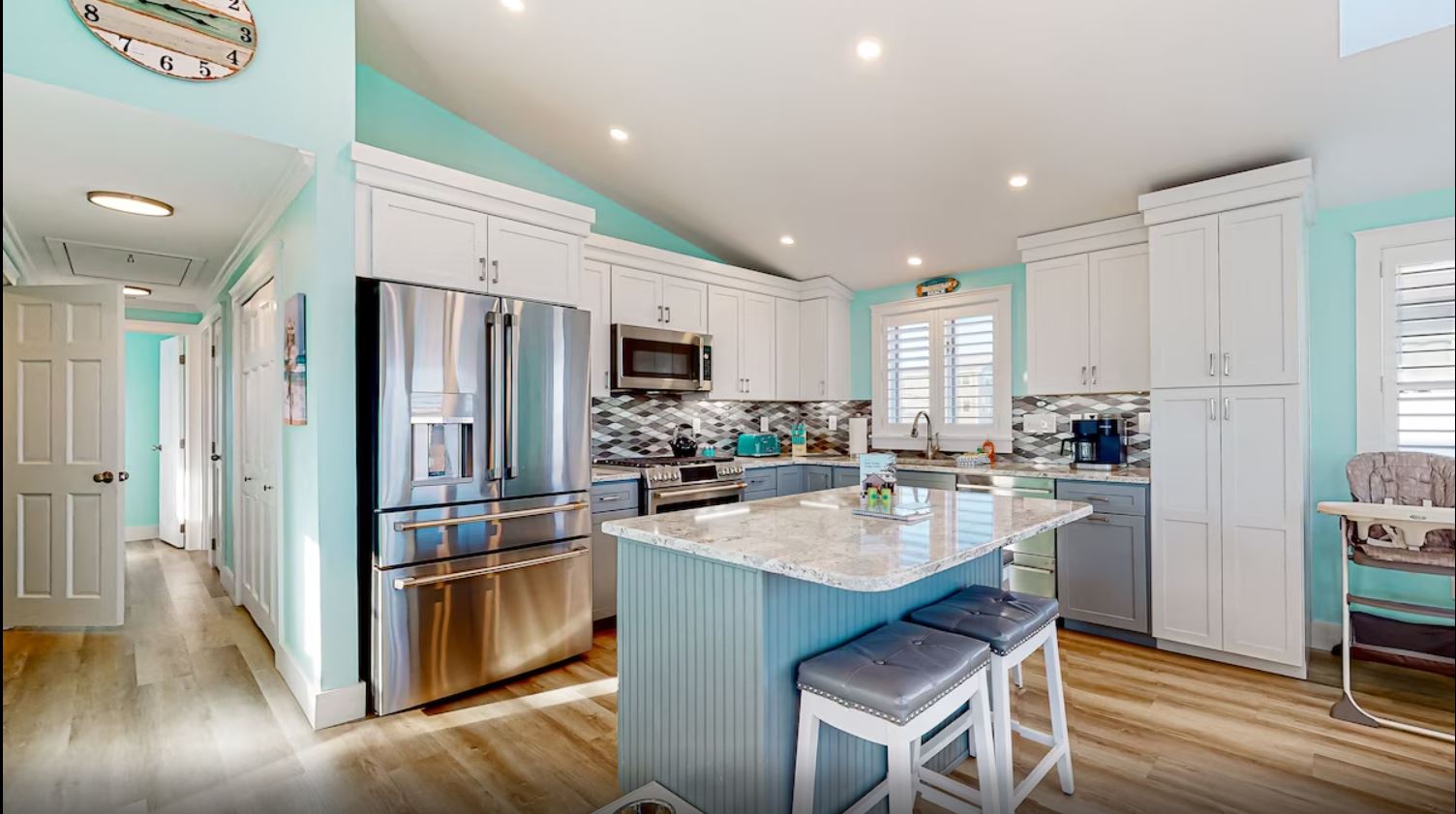 The open, airy kitchen offers ample space & all the comforts of home