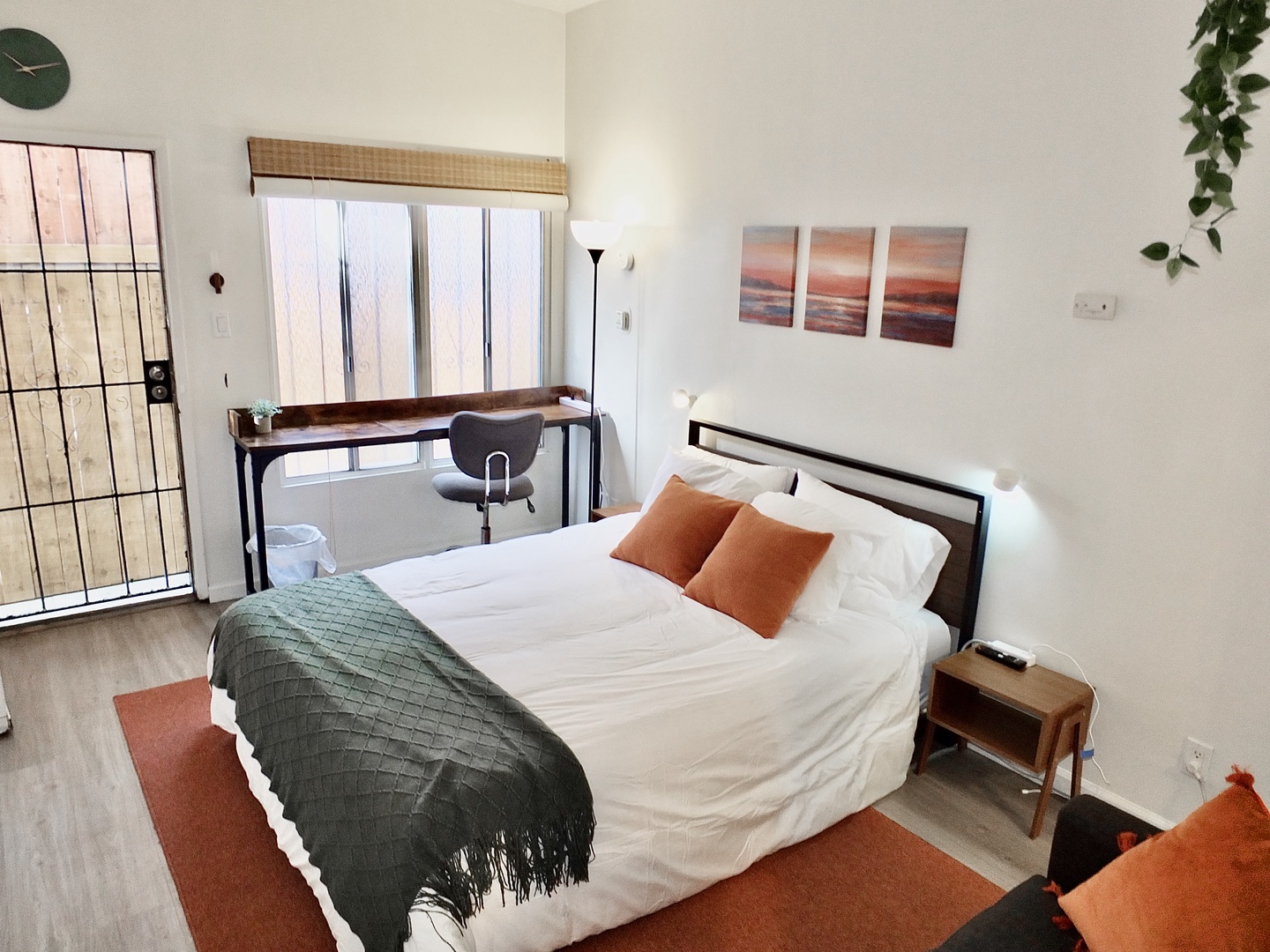 This comfy studio apartment offers a queen bed, Smart TV, & full kitchen