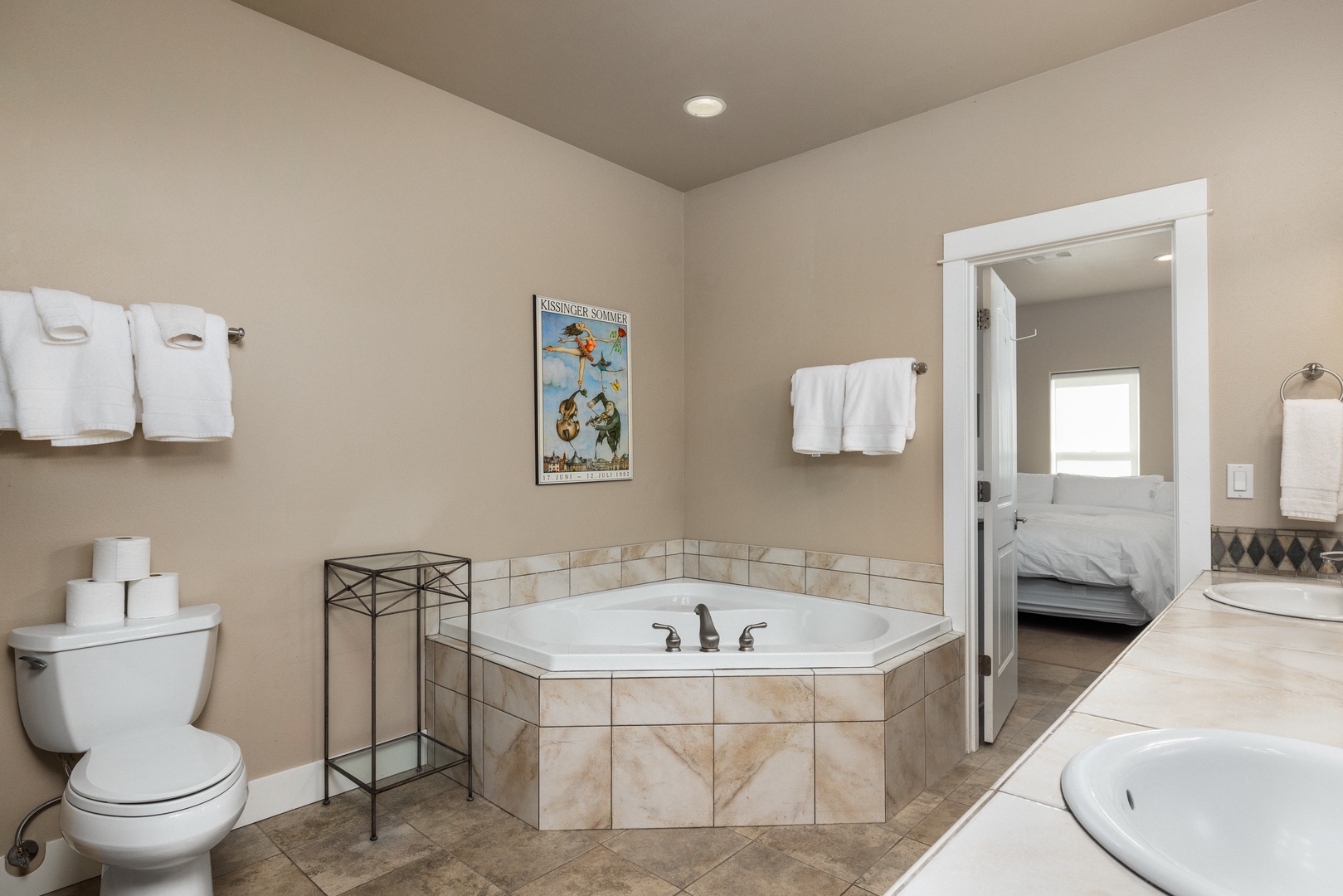 Jack and Jill style ensuite with separate shower, and soaking tub