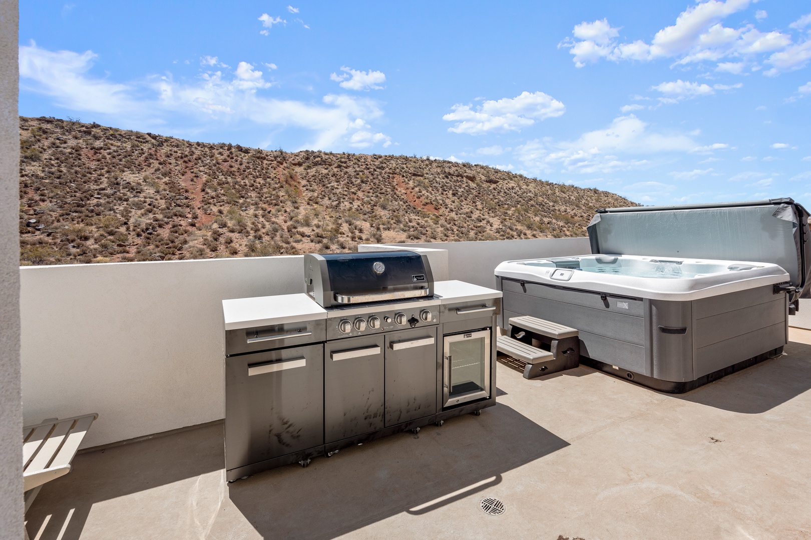 Bask in bubbling hot tub bliss or lounge in the sunshine on the rooftop deck!