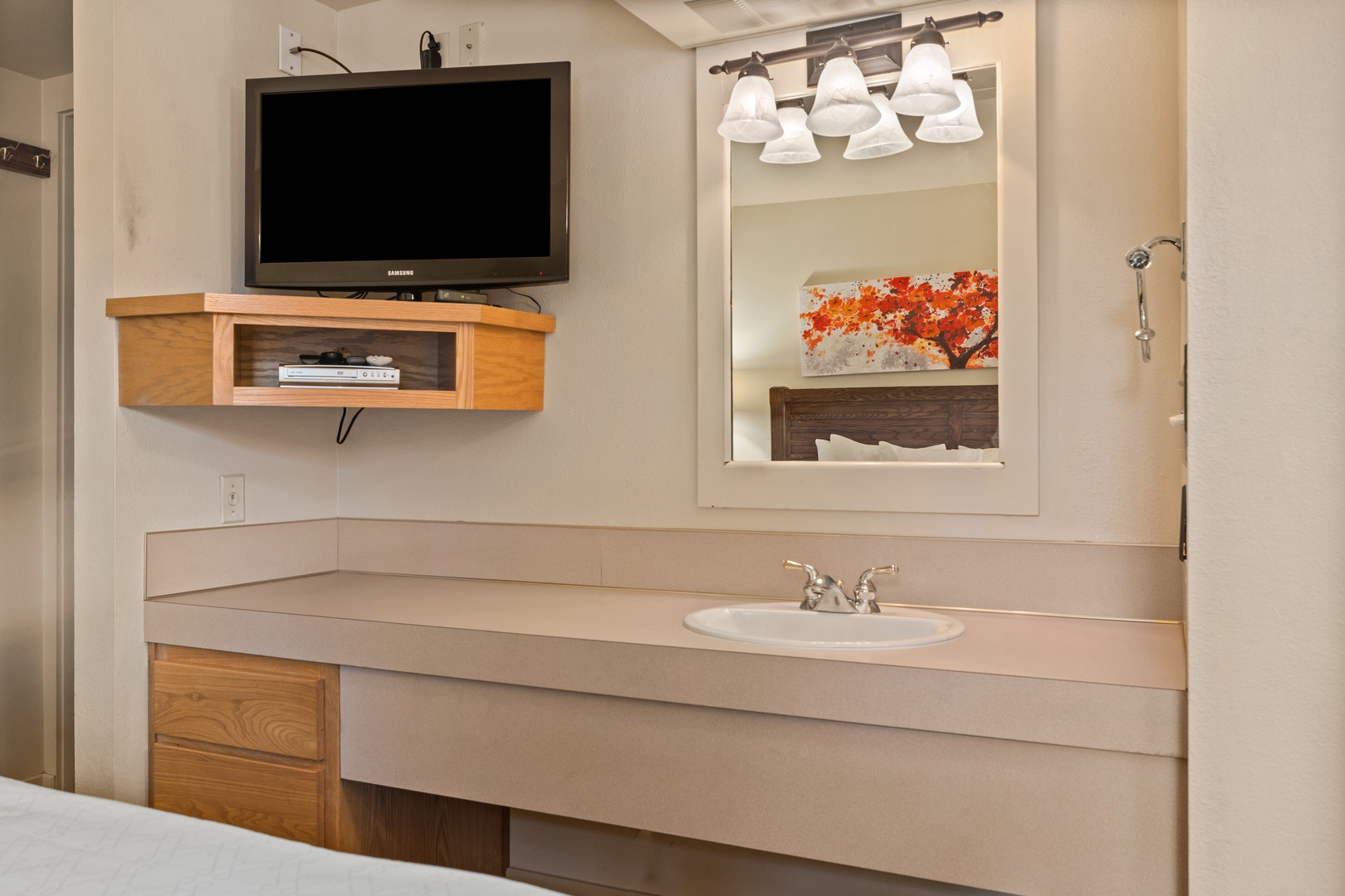 The master en suite includes an oversized single vanity & shower/tub combo