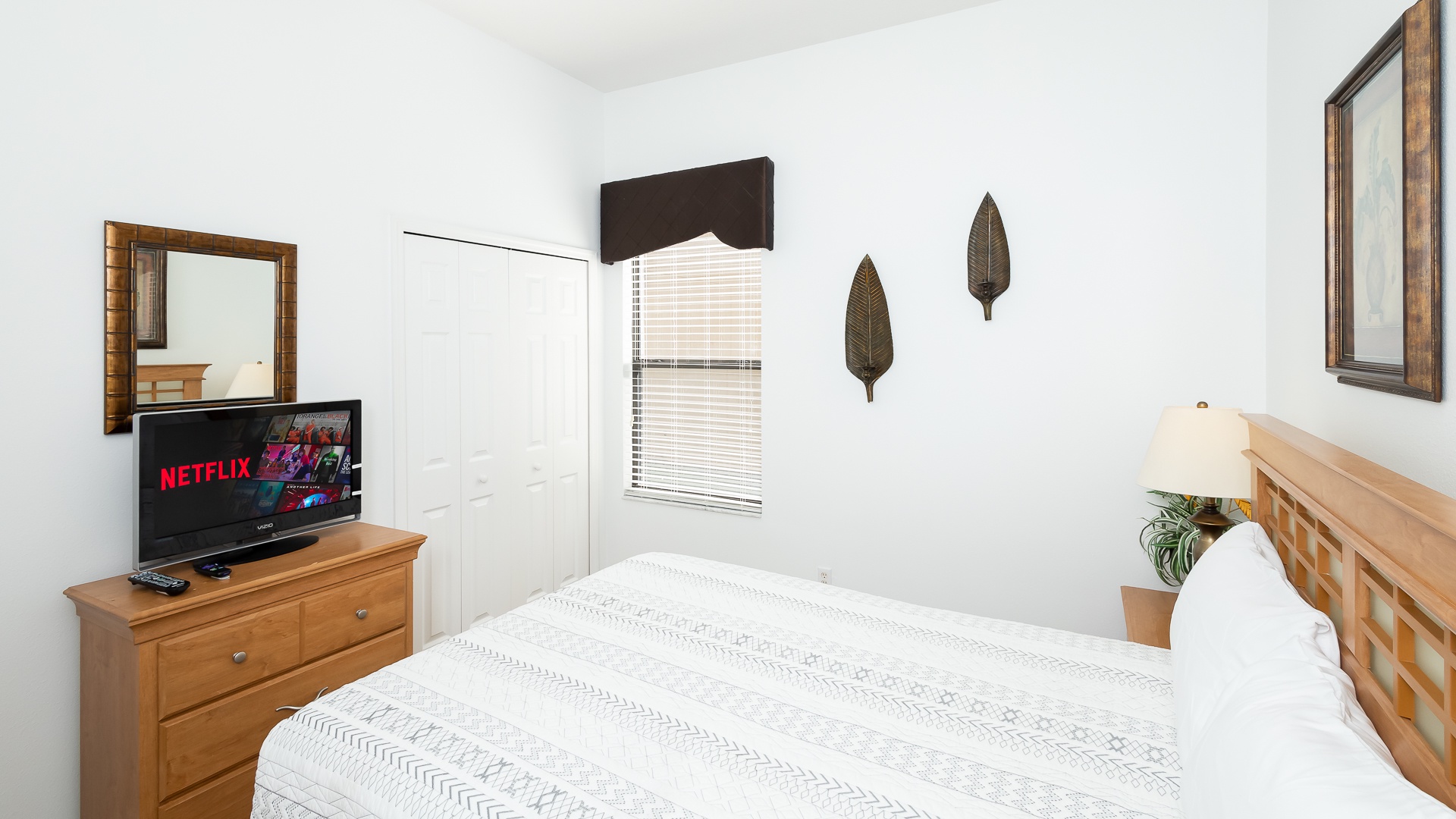 Bedroom 2 with queen bed and Smart TV