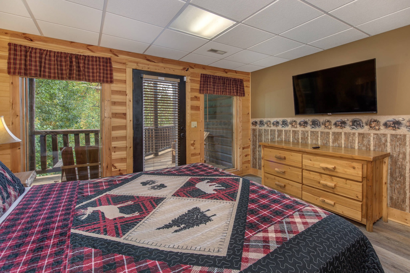 Bedroom 3 with King bed, Smart TV, deck access, and private en-suite