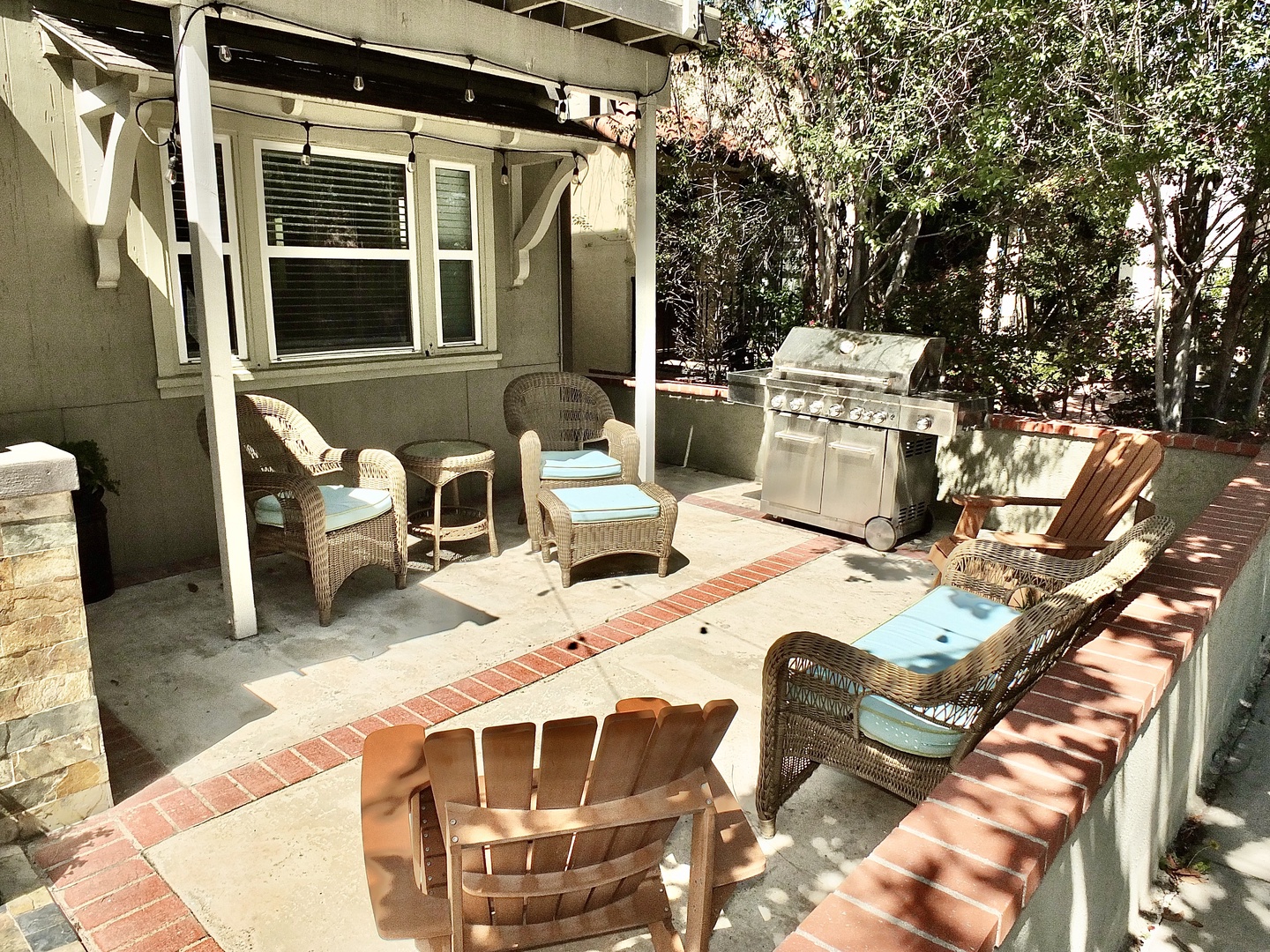 Lounge the day away & grill in the sunshine in the front patio area