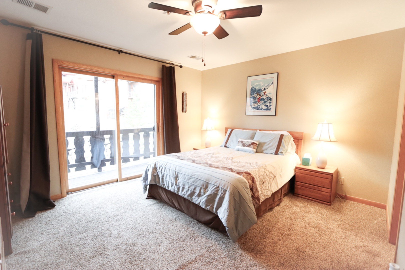 The queen suite offers a private en suite, TV, ceiling fan, & balcony access