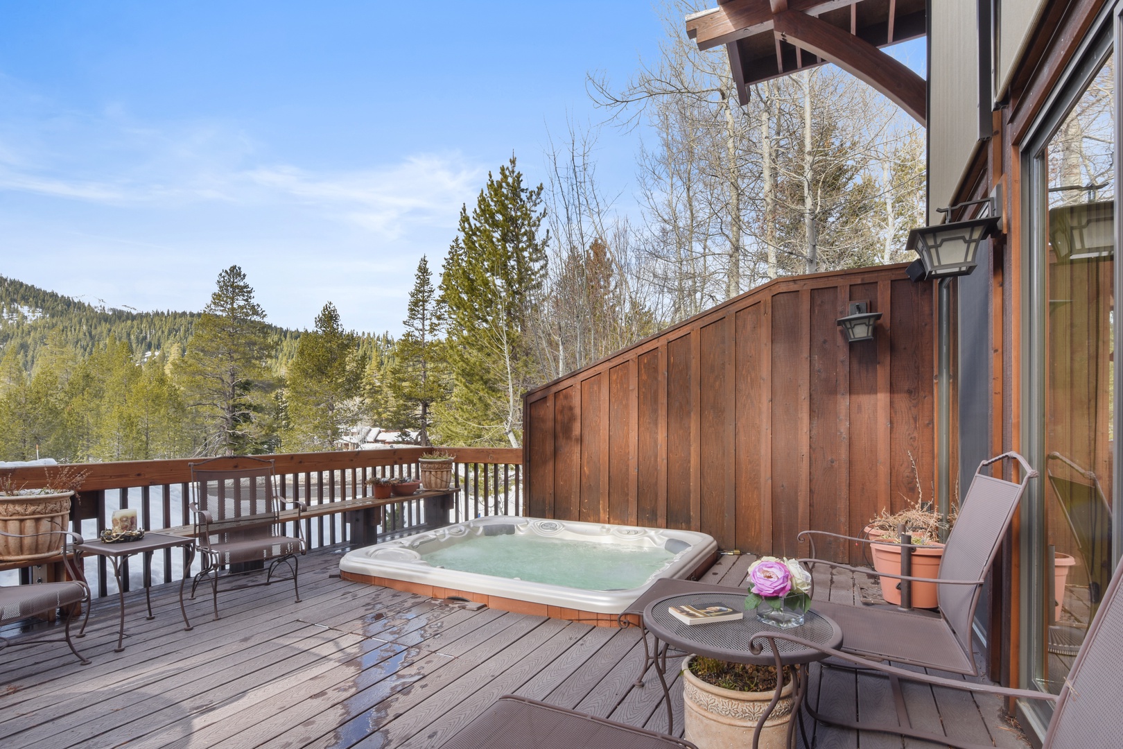 Deck w/ hot tub, seating, and gas BBQ grill