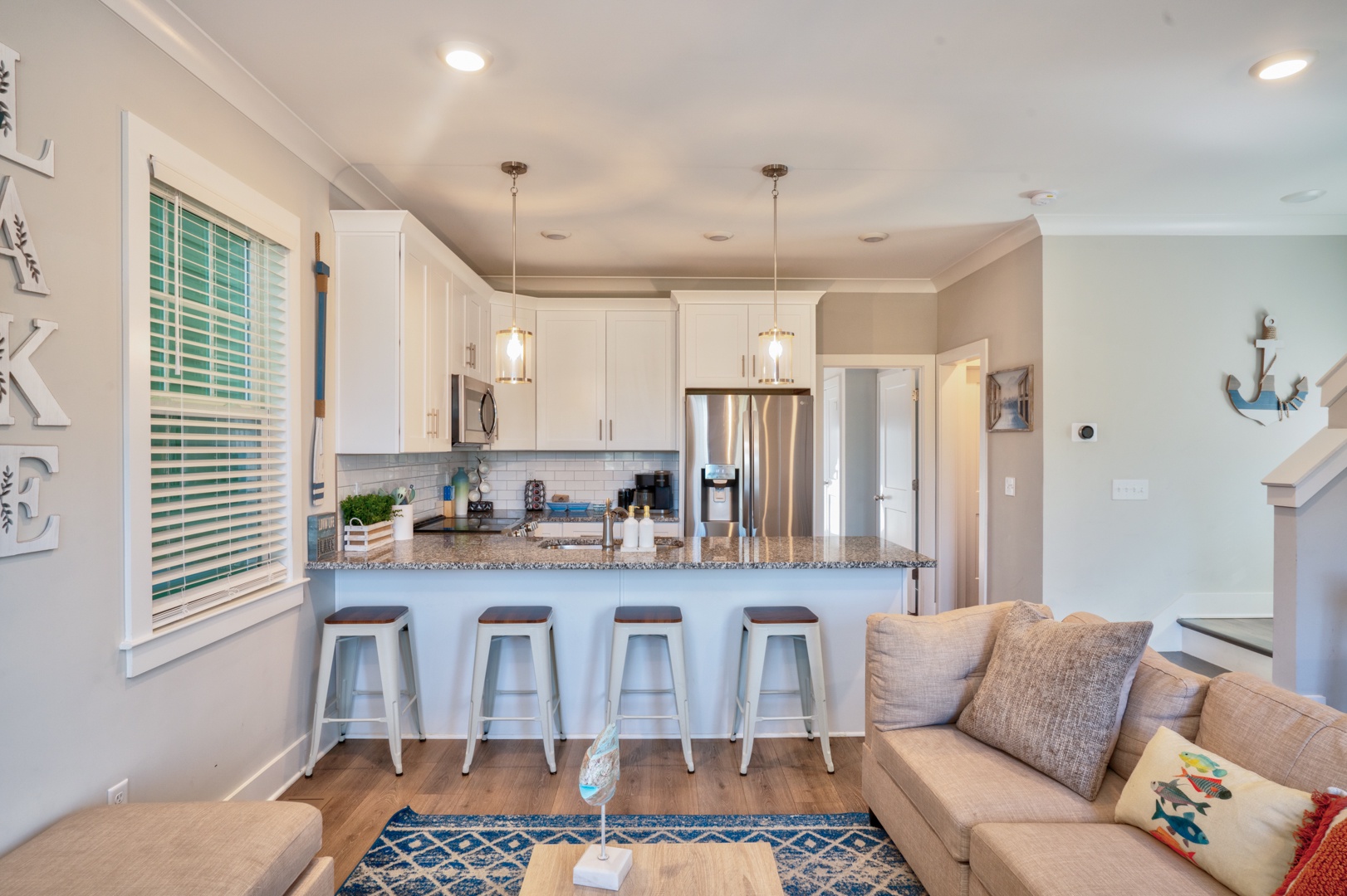Sip morning coffee or grab a bite at the kitchen counter, with space for 4