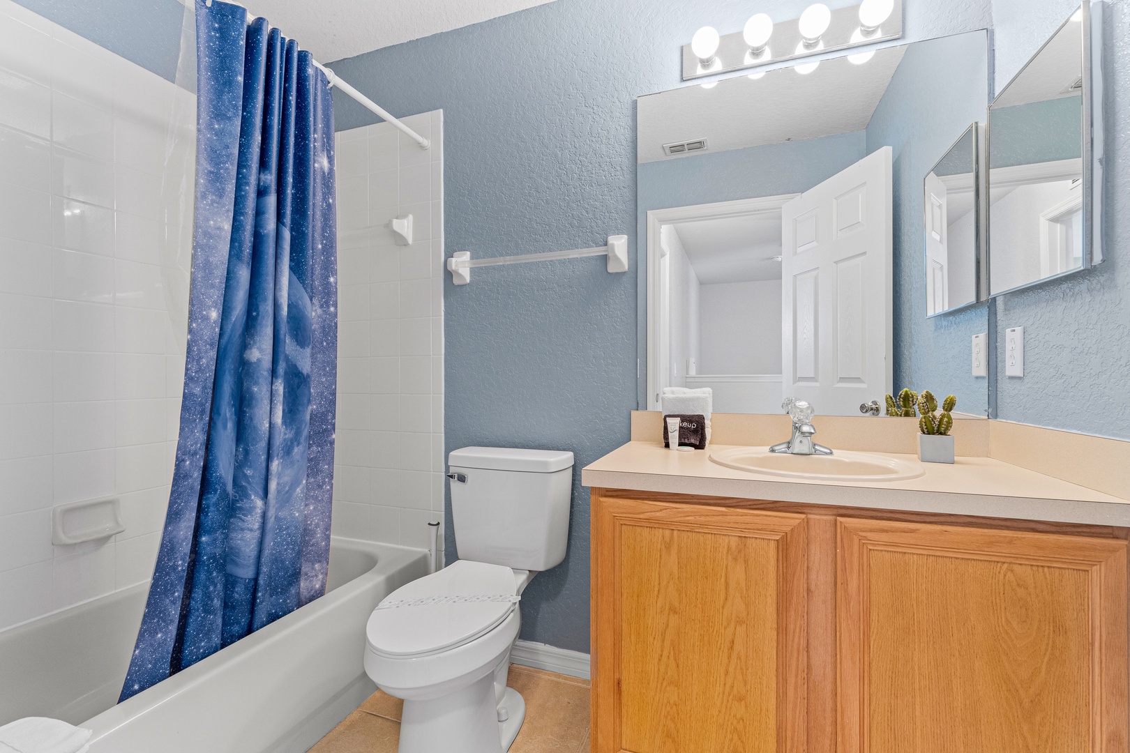 Shared full bath, shower tub combo. 2nd floor