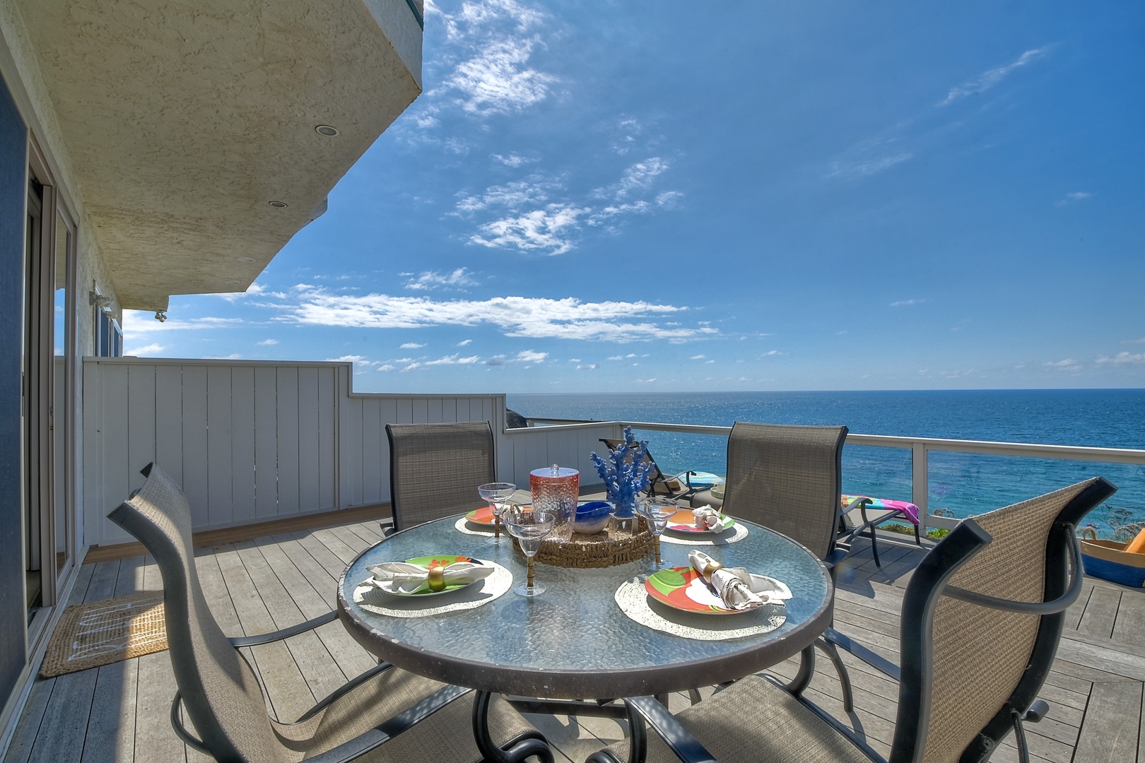 Lounge the day away or dine alfresco with ocean views on the deck