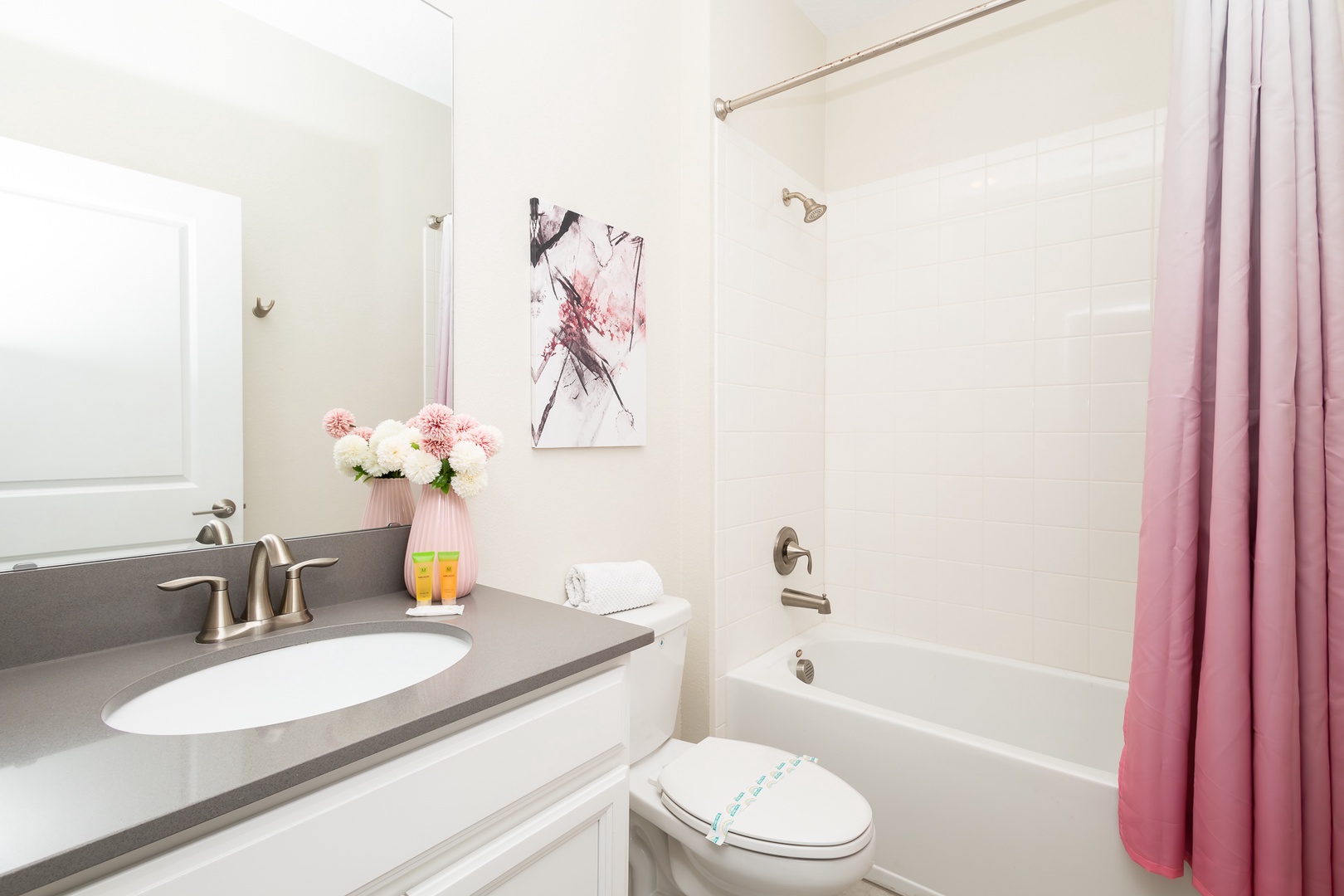 A single vanity & shower/tub combo are available in this main-floor full bath