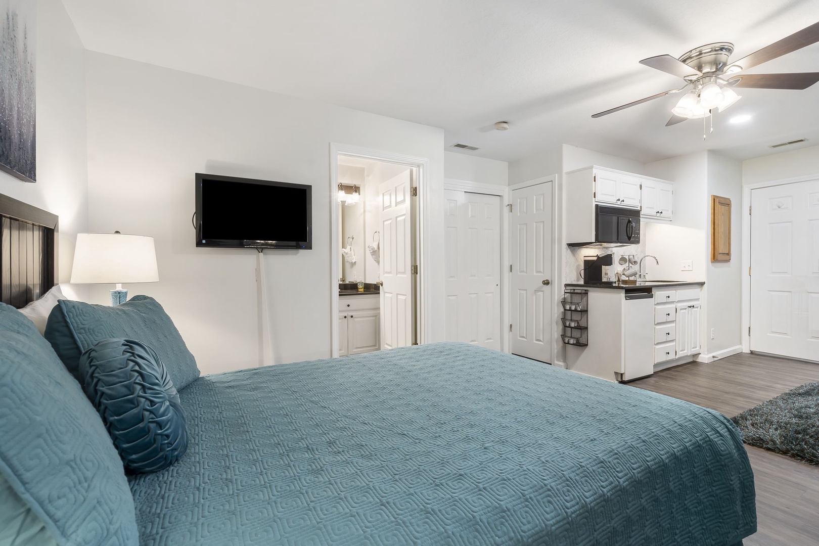 The private guest suite offers a kitchenette, Queen Bed, Bathroom, and Twin Sleeper Sofa
