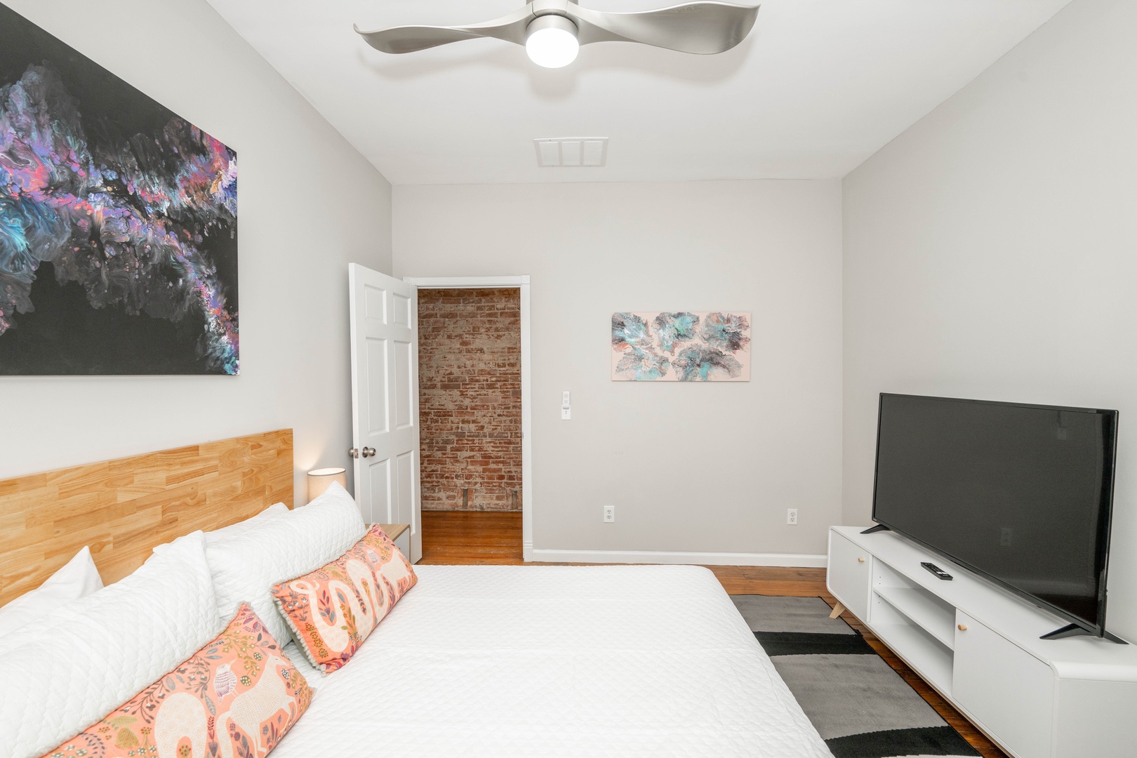 The second bedroom sanctuary offers a king-sized bed & Smart TV