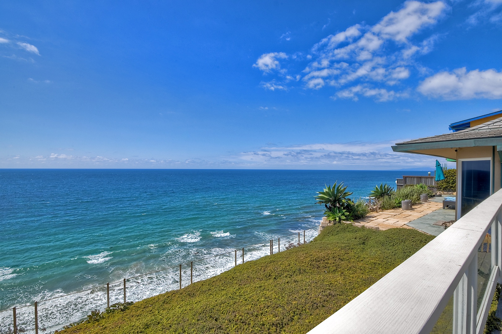 Lounge the day away or dine alfresco with ocean views on the deck