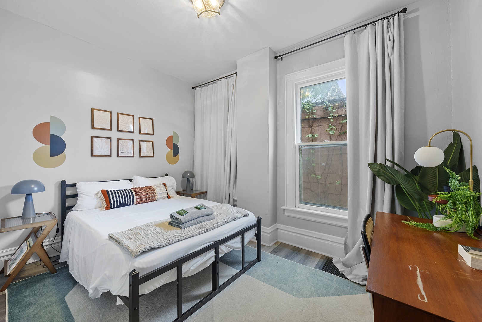 Recharge or catch up on emails in Apartment 1164’s second stylish king bedroom