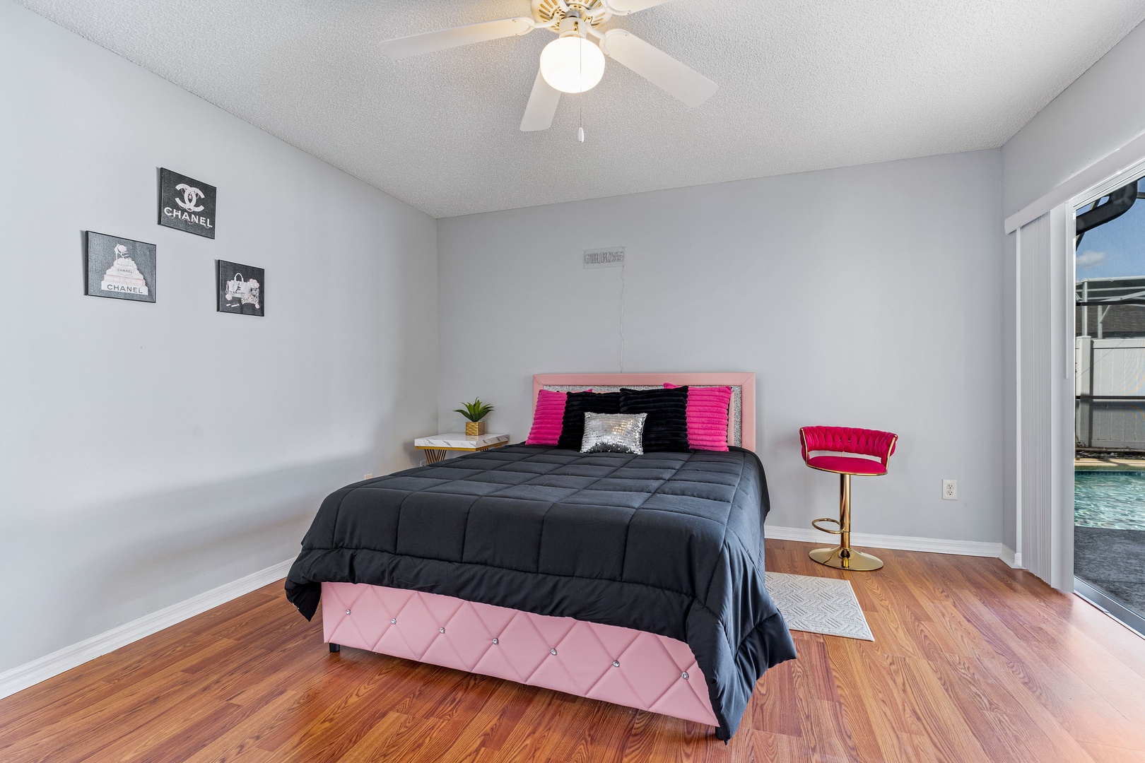 Bedroom 4 with queen bed, patio access, and ensuite