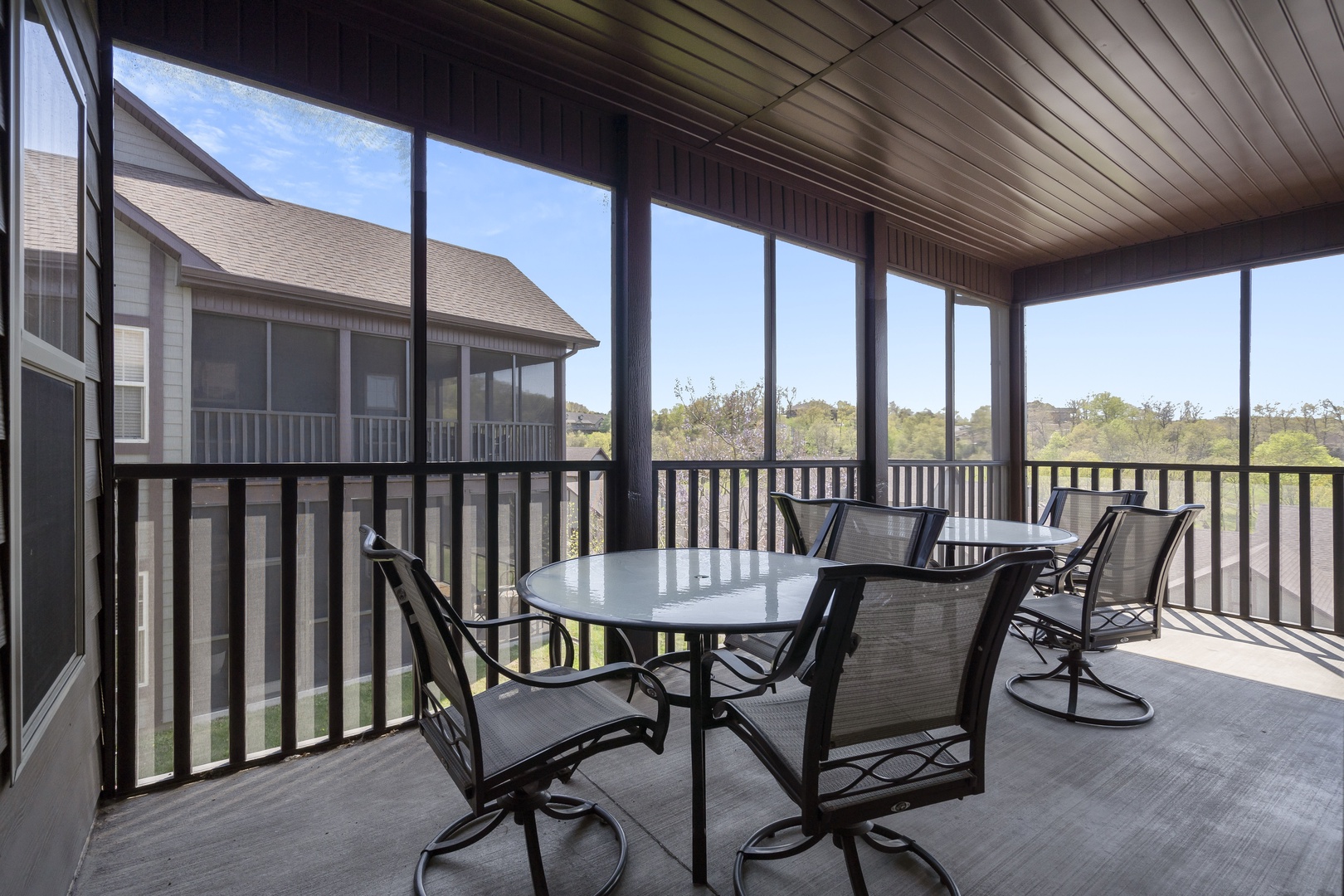 Screened deck with outdoor furniture