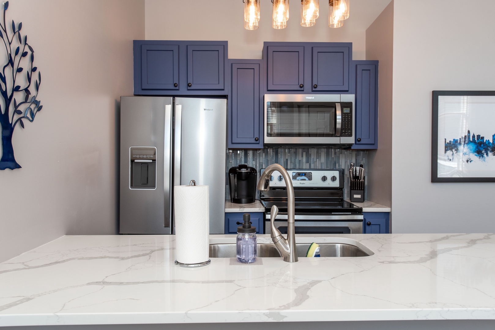 Apt 1 – The polished kitchen offers ample space & all the comforts of home