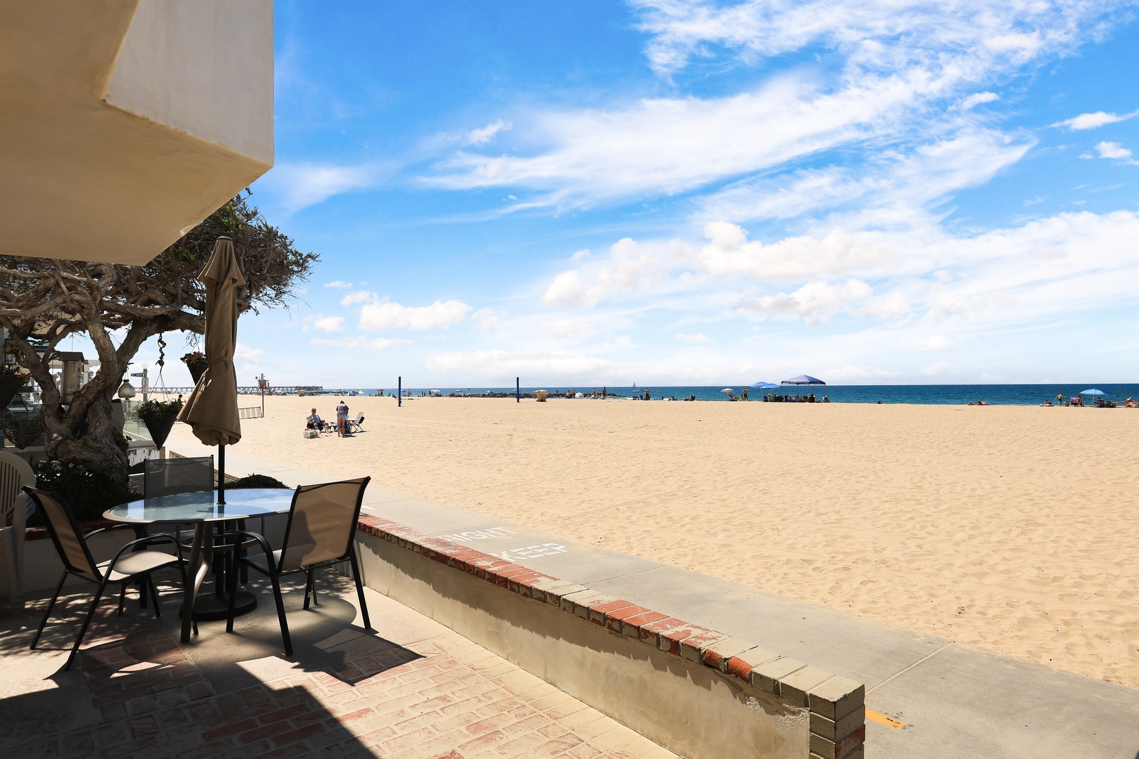 Lounge the day away seaside on the breezy patio