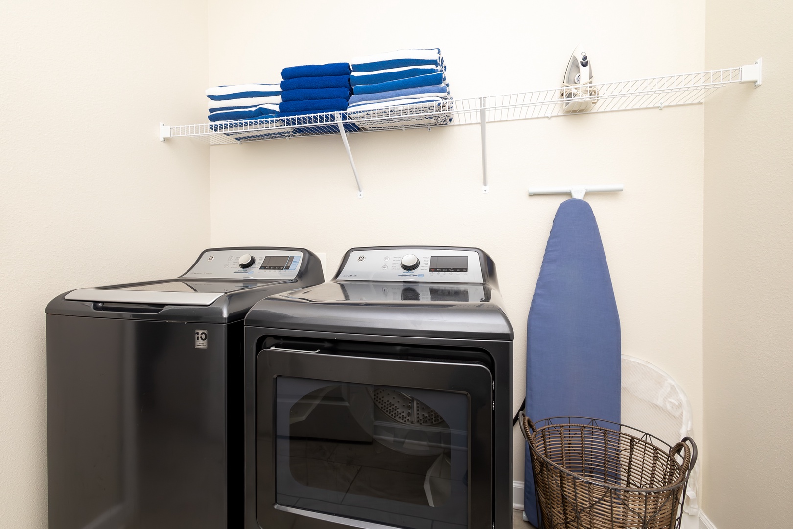 Private laundry is available for your stay, tucked away off the kitchen