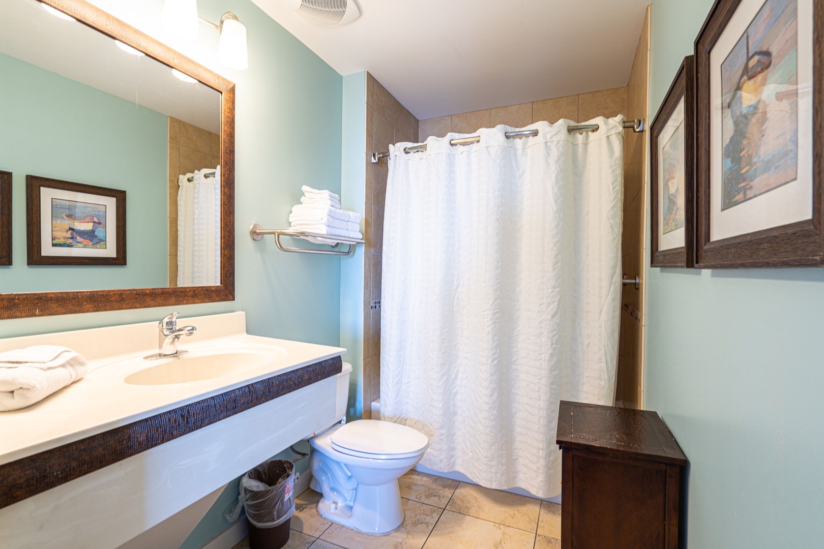 A single vanity & shower/tub combo await in the second full bathroom