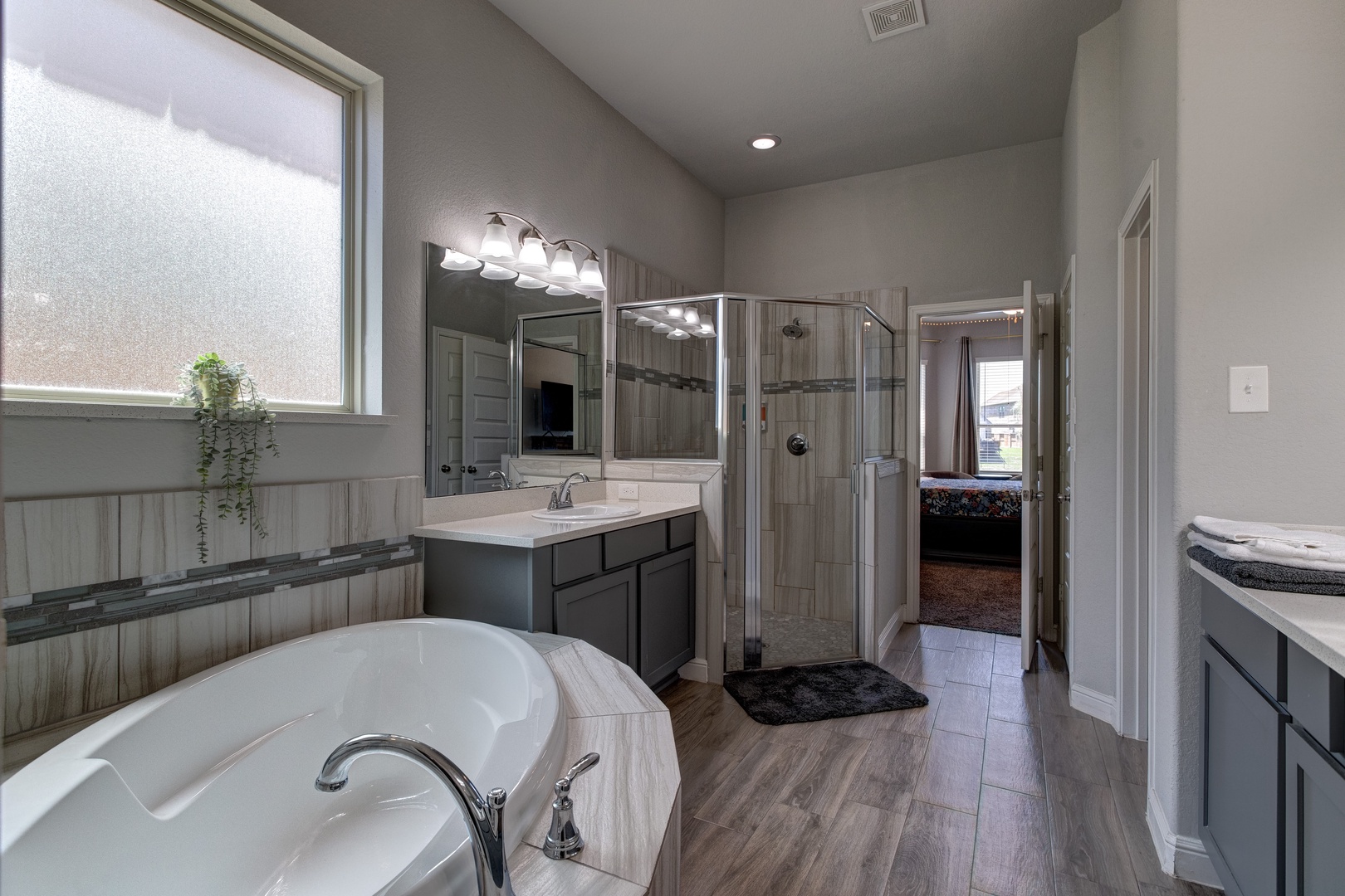 Ensuite bathroom with separate shower and tub