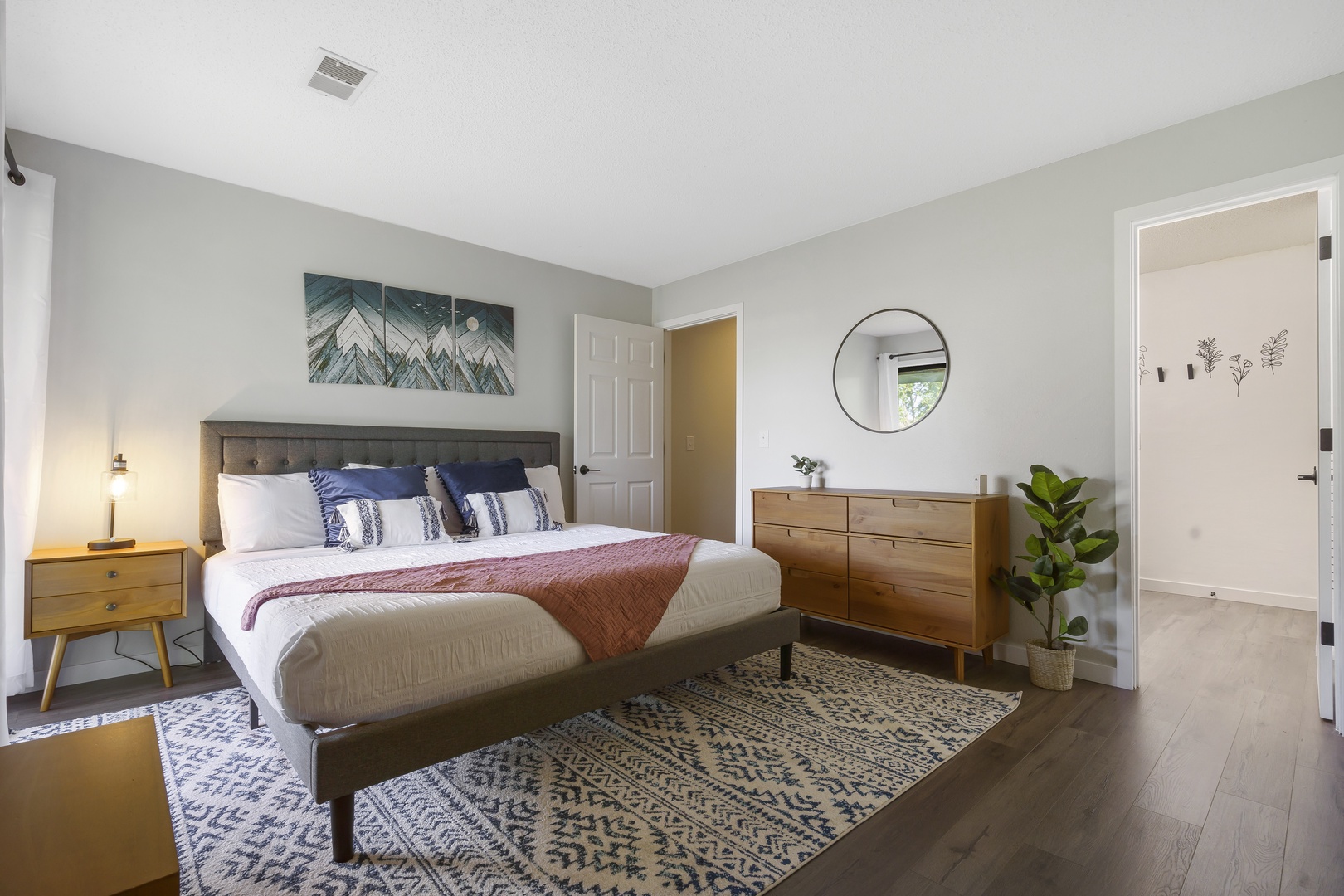 Master bedroom features king bed, SmartTV & en-suite
