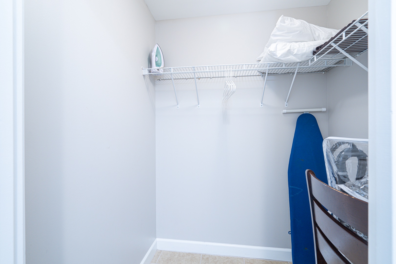 The master bedroom walk-in closet is perfect for organizing clothes & bags