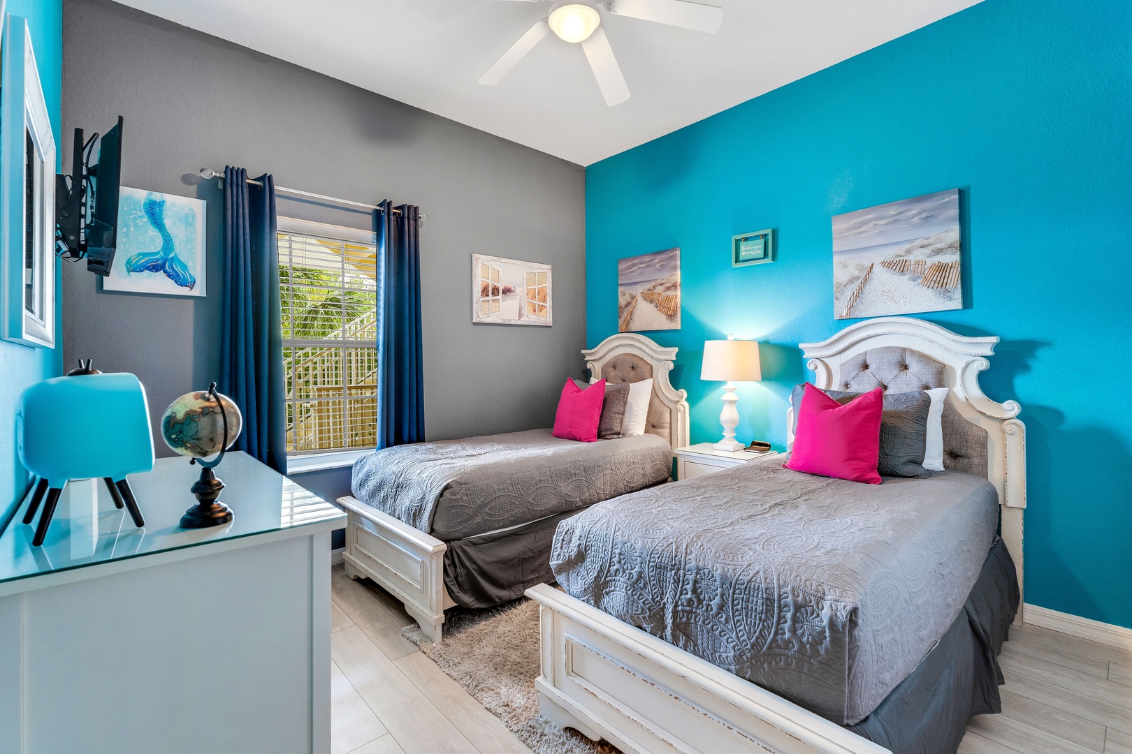 The third bedroom sanctuary offers a pair of plush twin beds & Smart TV