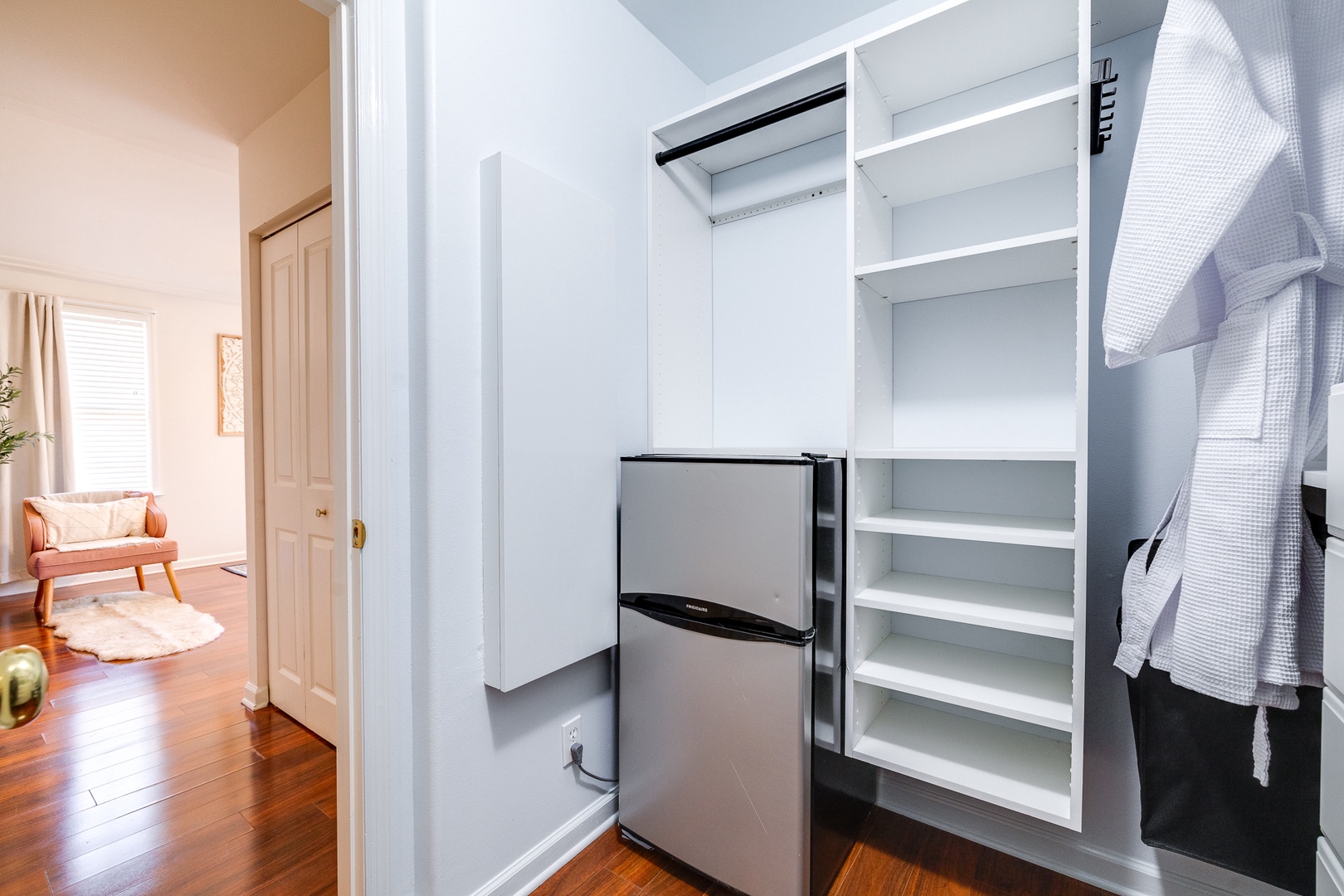 master closet with mini fridge