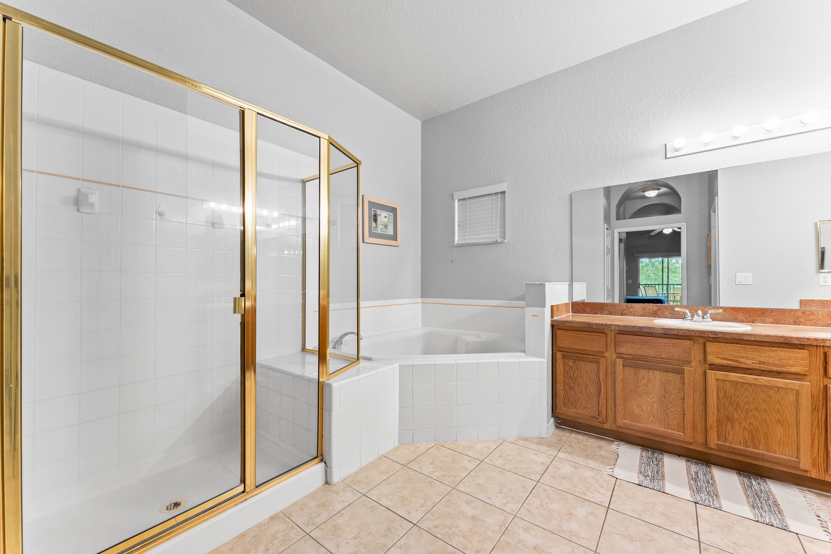 Private ensuite with dual vanity, soaking tub, separate shower