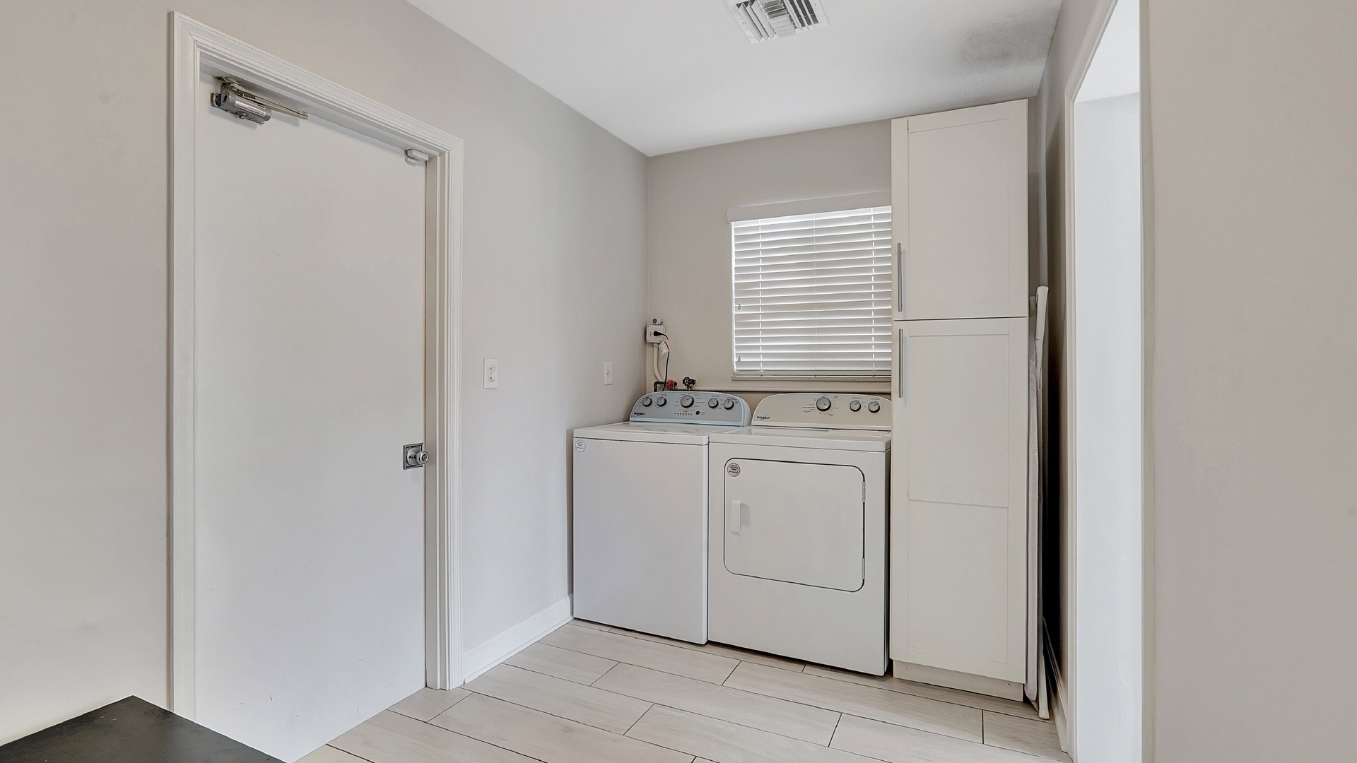 Laundry area off of the kitchen