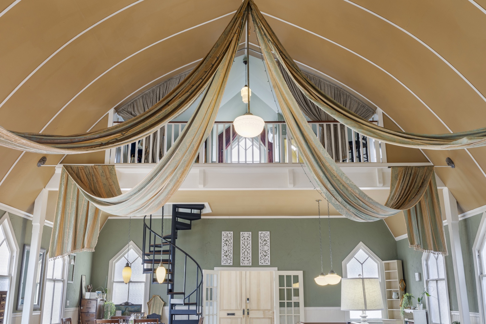 Recharge in the loft sleeping area, boasting a plush queen-sized bed