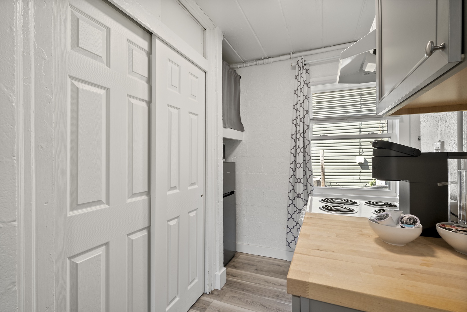 The chic kitchen provides plenty of storage and all the comforts of home