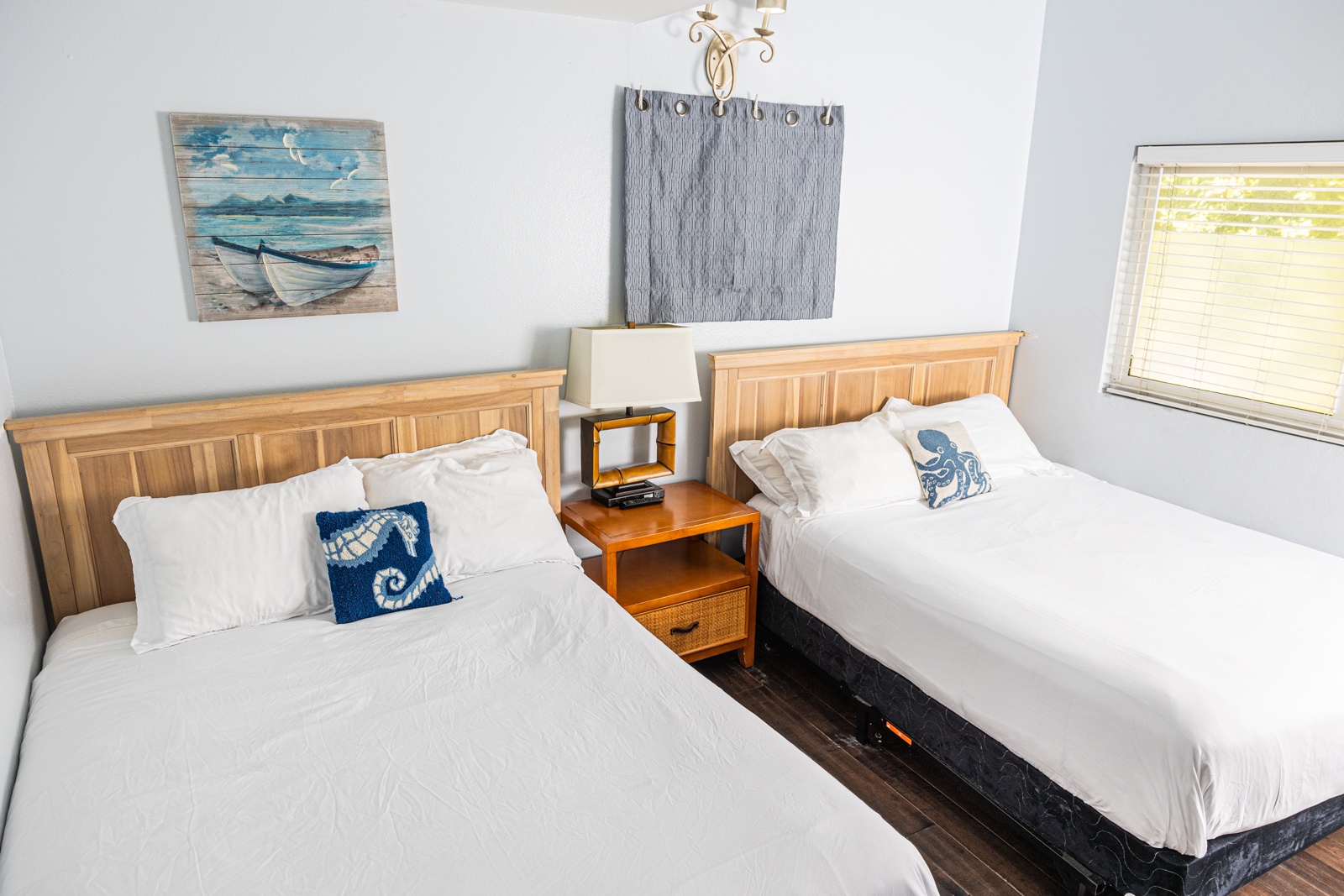 Recharge in the second bedroom retreat, featuring 2 queen beds