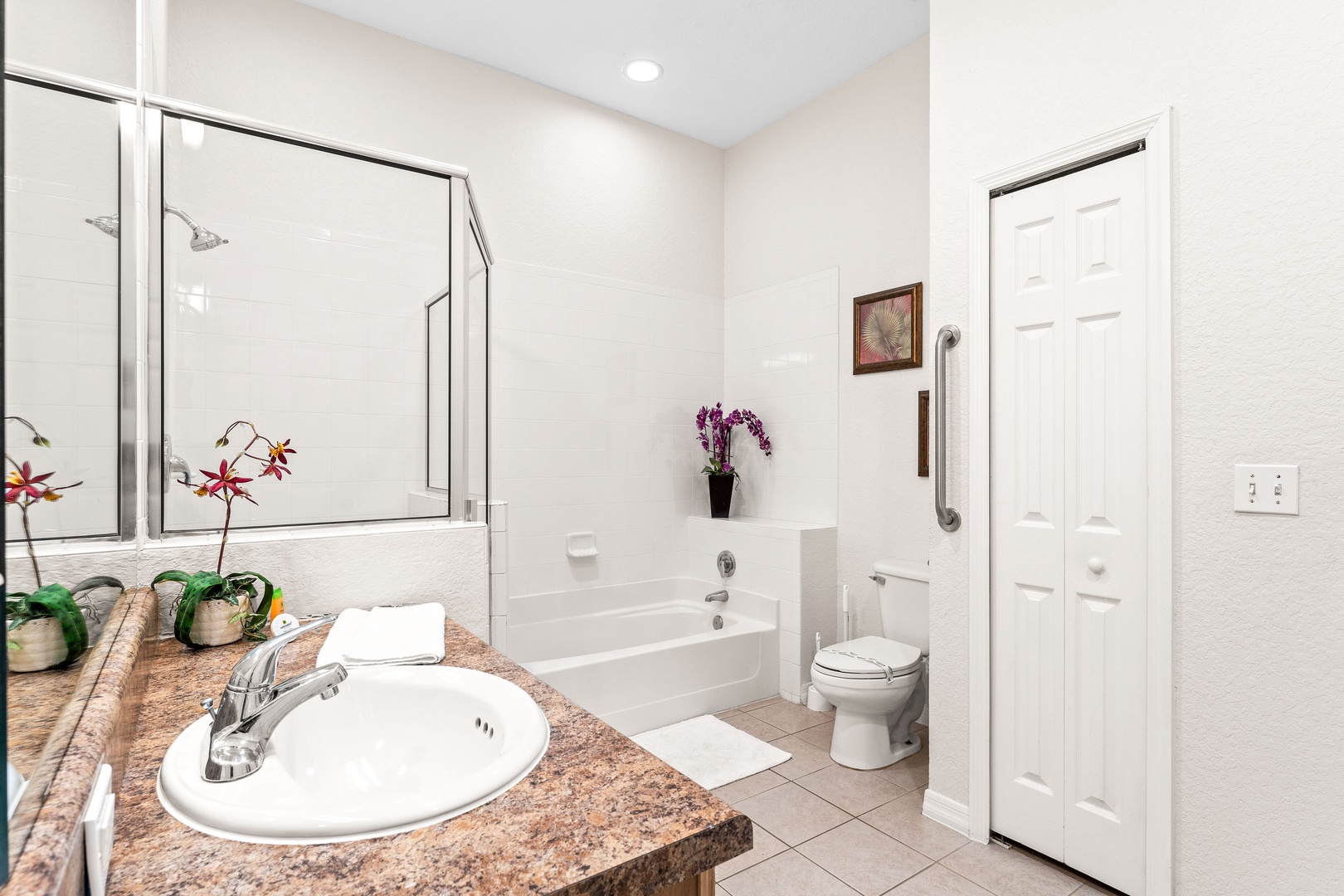 Shared bathroom with separate tub & shower accessible from hallway & Bedroom 2