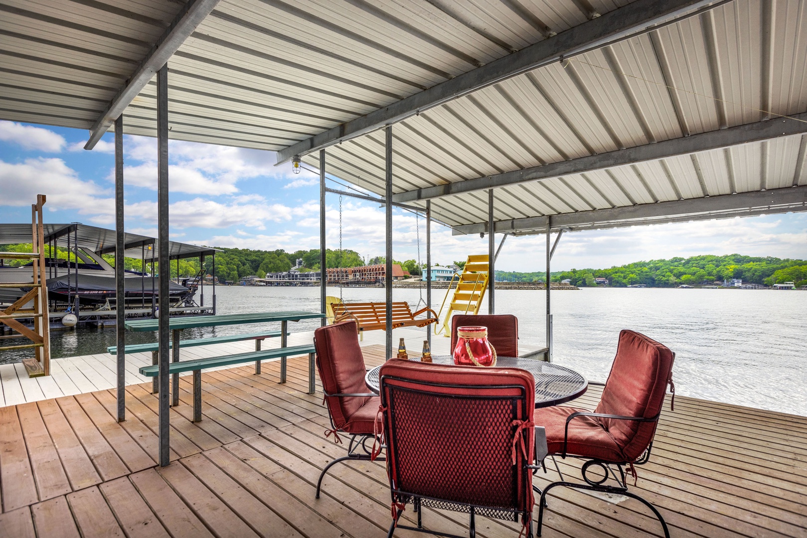 Sink into cozy dock seating while watching the kids swim off the dock