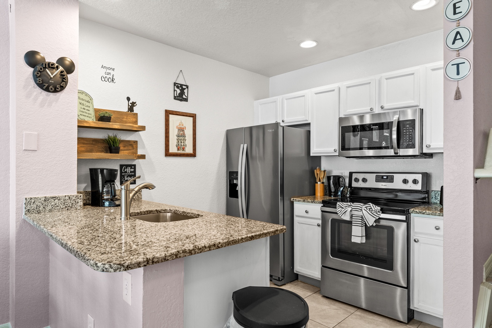The open, airy kitchen offers ample space & all the comforts of home