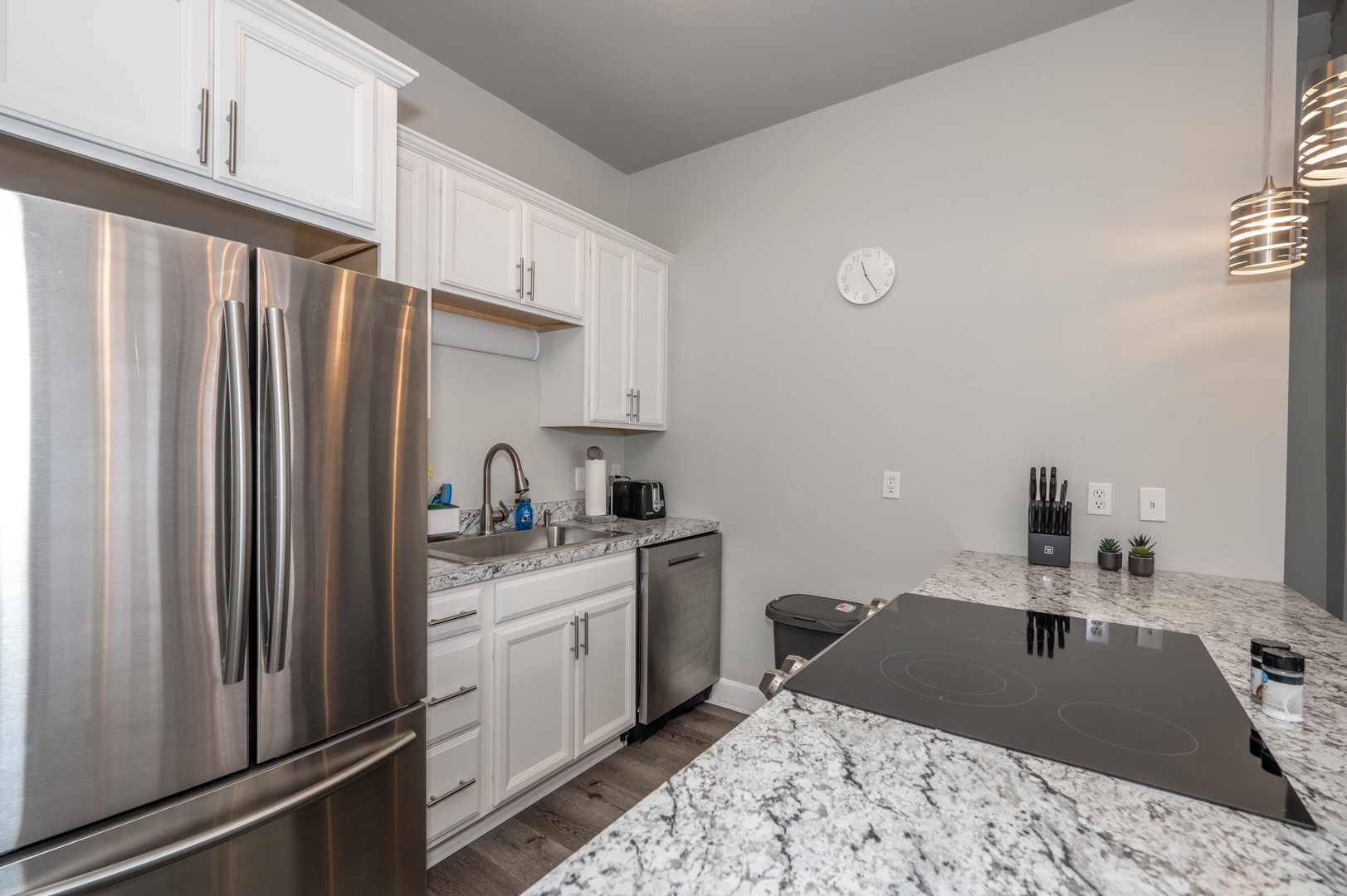 Unit 2: The well-equipped kitchen is spacious and open to the living area