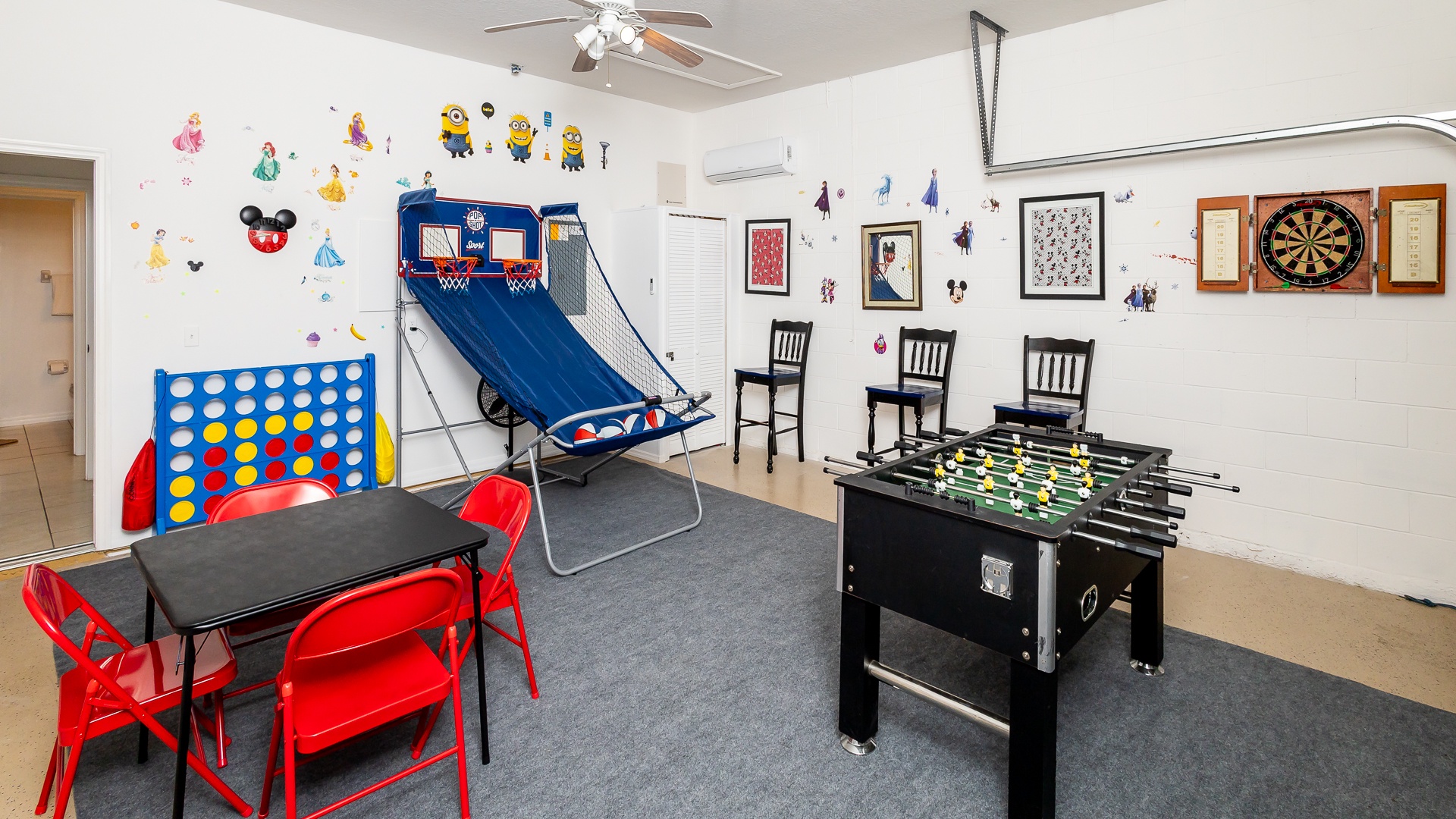 Game room with foosball table, dart board, life size connect 4, and more