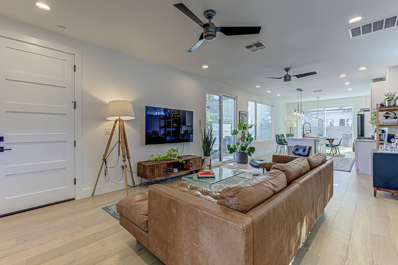 Open living space with Smart TV, and leather seating