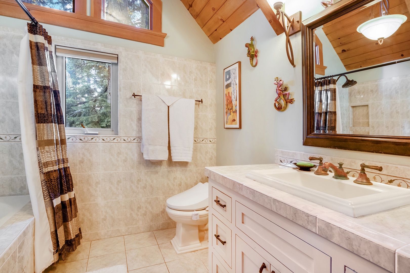 Third-floor spa-like retreat with a bidet, soaker tub, and shower combo