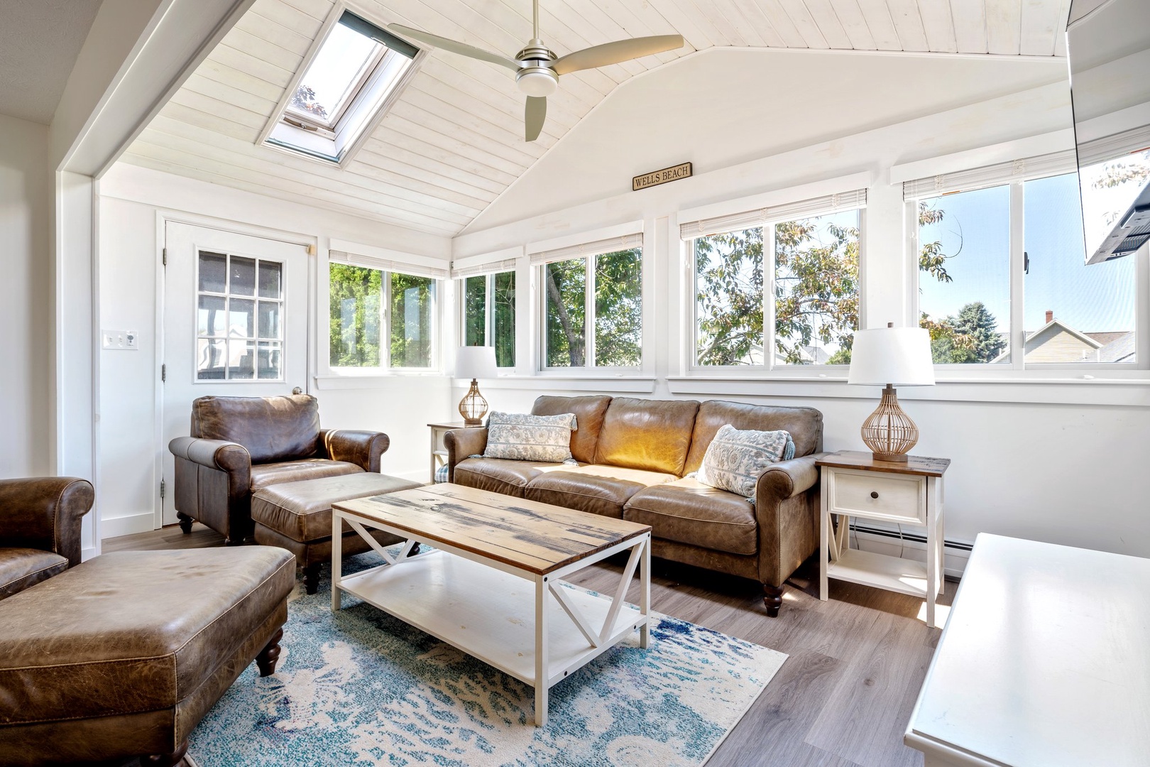 Bright second-floor sunroom, perfect for lounging