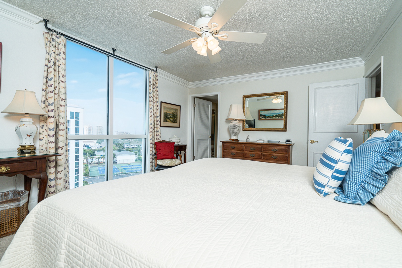 The regal king suite boasts a private ensuite, TV, & stunning city views