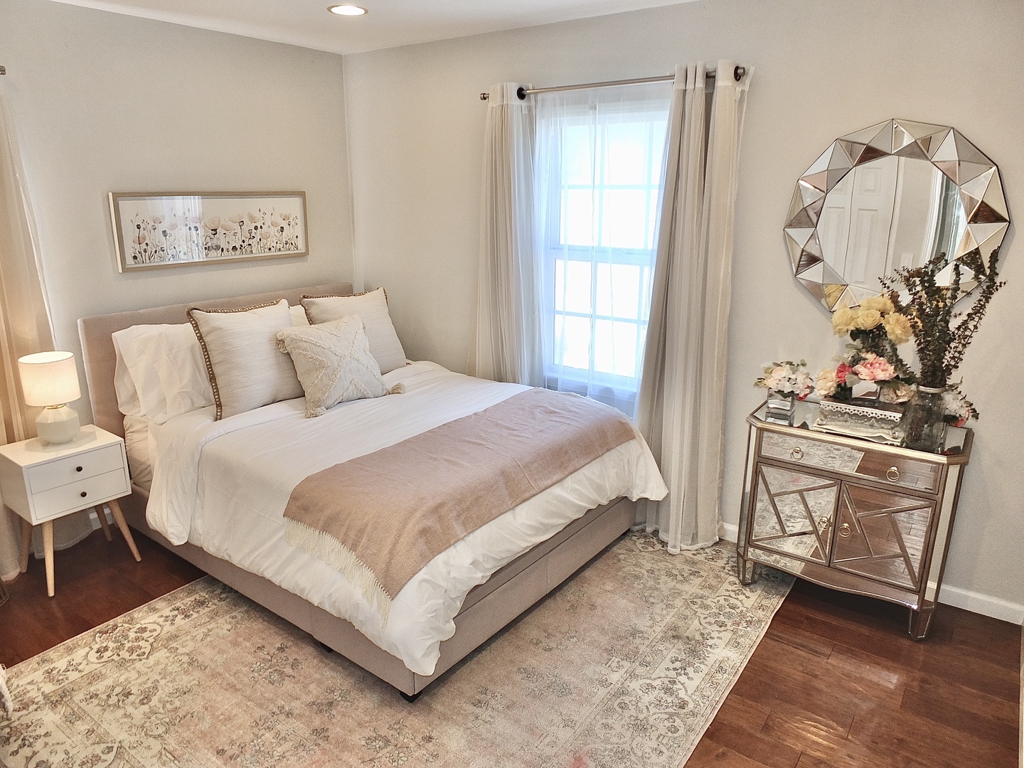 Relax in the second bedroom, featuring a queen bed & closet