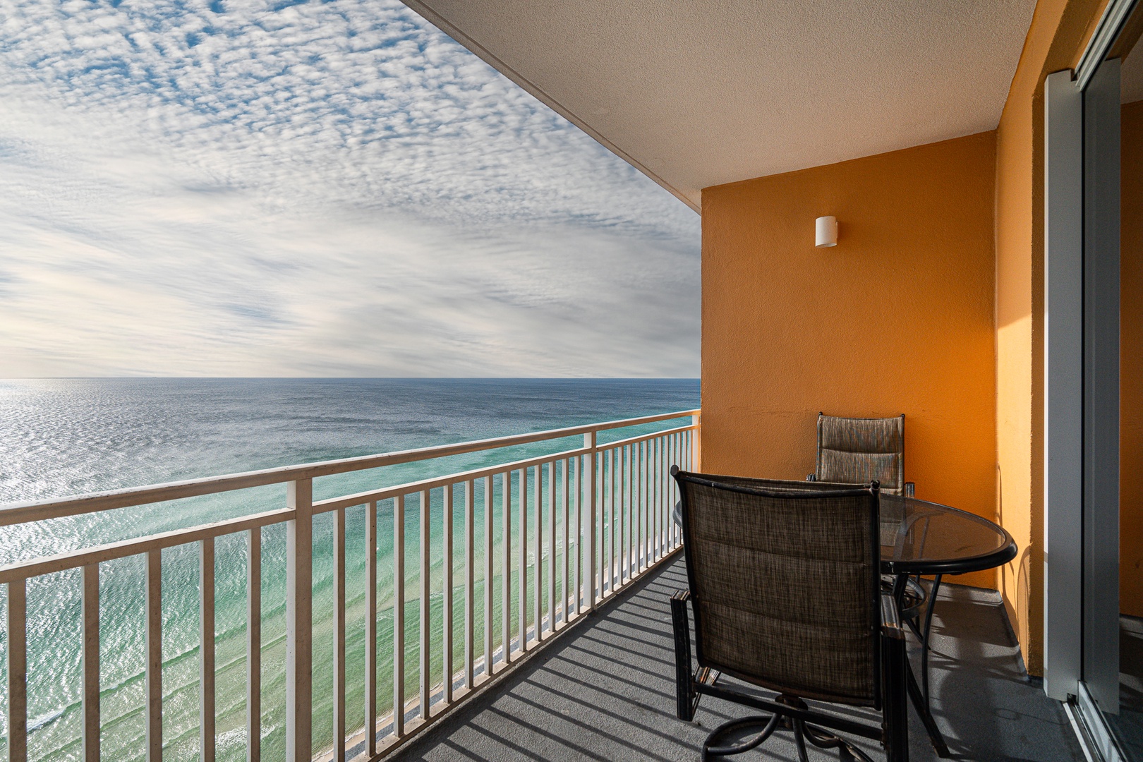 Dine alfresco with breathtaking beach views on the balcony