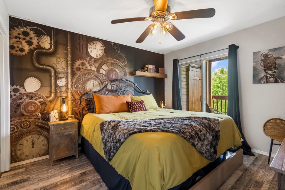 Find the time to slumber in this King Bedroom with TV, En Suite, and Deck Access
