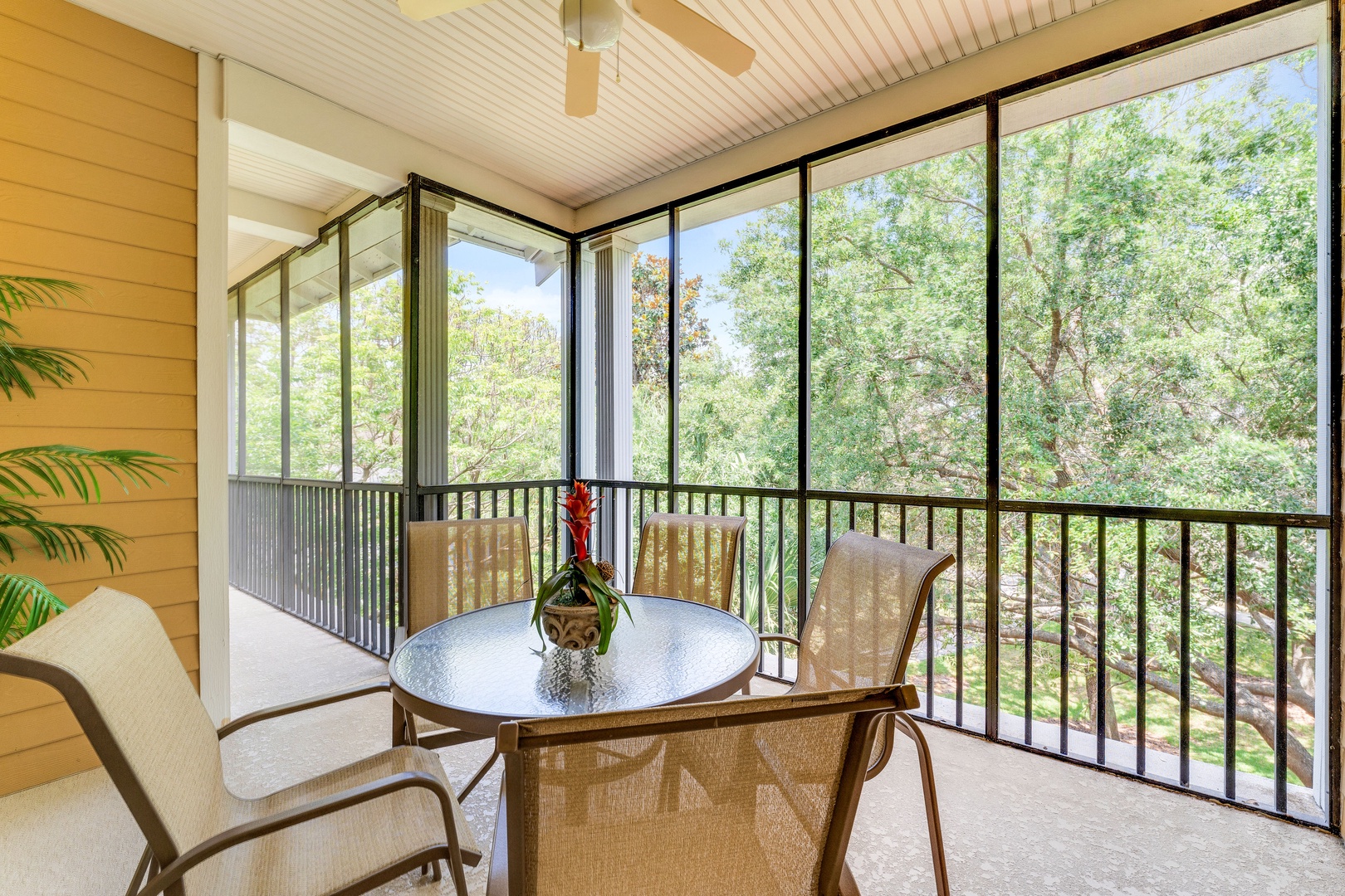 Step out onto the screened balcony & lounge in the fresh air